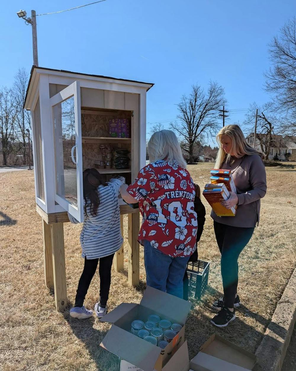 <p><em>Members of the Elks made sure the pantry was stocked. (Photo by Jim Castelize)﻿</em></p>