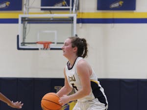 Senior captain Izzy Leazier with the ball (Photo courtesy of Elizabeth Gladstone / Multimedia Coordinator).