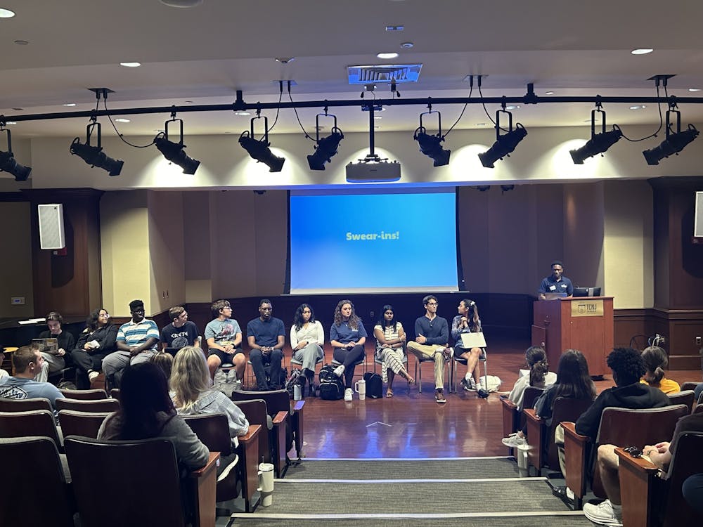 <p><em>Jared Williams, the Student Government&#x27;s executive president, led the swearing-in ceremony for all newly elected officers (Photo courtesy of Julia Cappello).﻿</em></p>