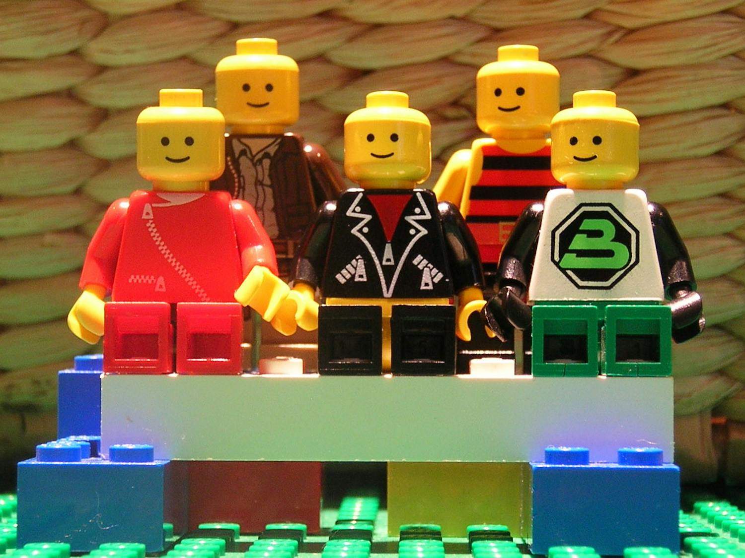 Toymaker LEGO plans to replace the fossil fuels used in making its signature bricks with recycled materials by 2026, turning half of its plastic renewable in an effort to be more environmentally friendly (Photo courtesy of Wikimedia Commons / “Lego Family” by the great 8. April 16, 2011).