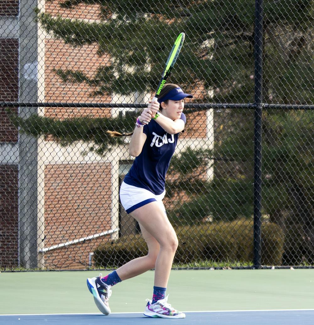 <p><em>Freshman Zoey Albert in one of her matches (Photo courtesy of Brielle Zemer / Staff Photographer).</em></p>