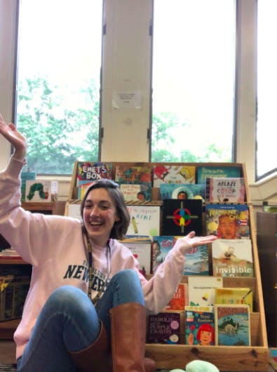 Art teacher and College alumna Megan Scarborough poses inside her classroom at the Indian Island School in Maine (Photo courtesy of Megan Scarborough).