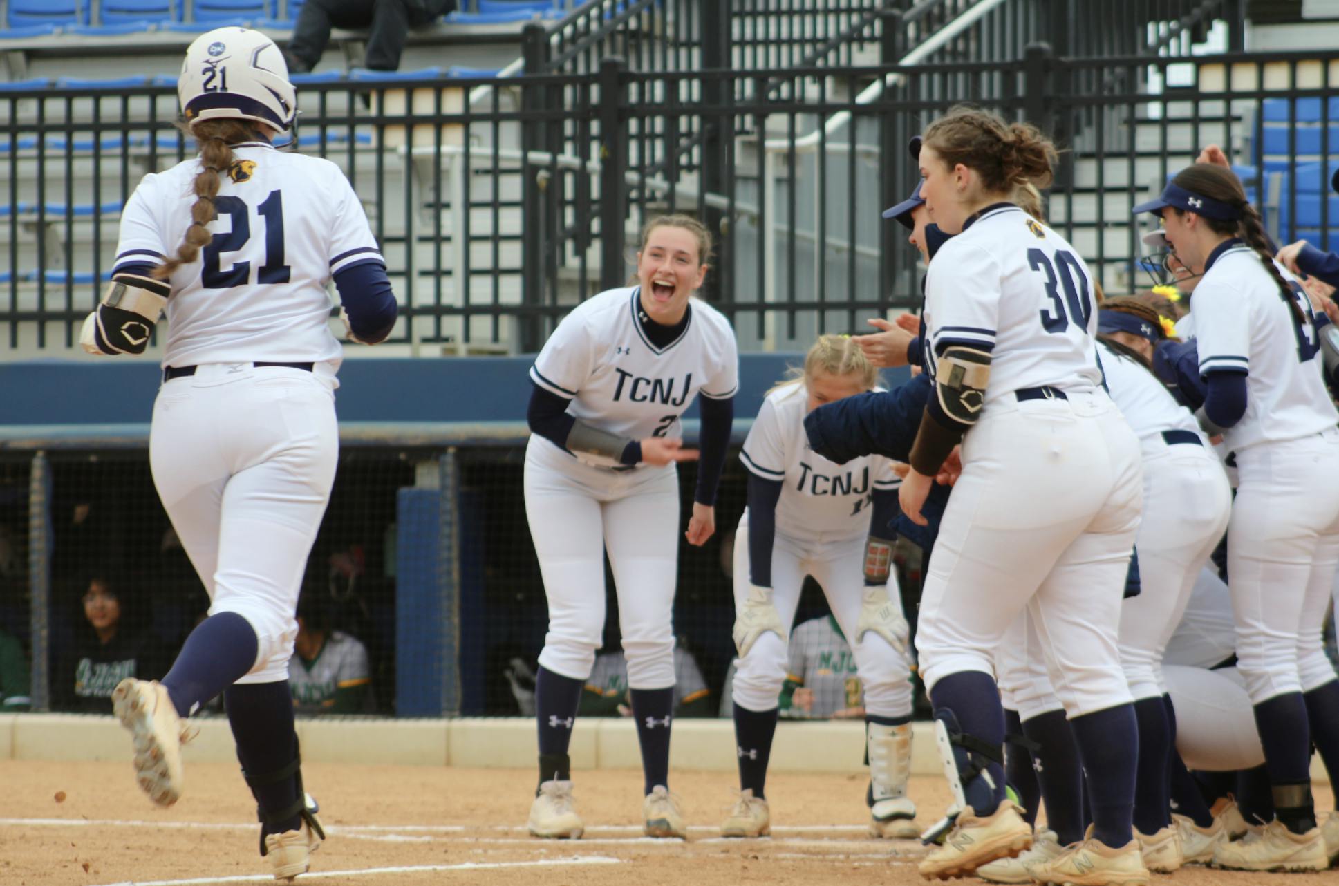 The Lions celebrating a victory (Photo courtesy of Elizabeth Gladstone / Multimedia Coordinator).