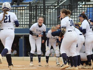 The Lions celebrating a victory (Photo courtesy of Elizabeth Gladstone / Multimedia Coordinator).