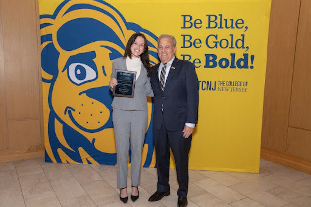 <p><em>Sarah Kasziba-O&#x27;Rahilly with President Bernstein at the Blue and Gold ceremony on April 17. (Photo courtesy of Sarah Kasziba-O&#x27;Rahilly)</em></p><p></p>