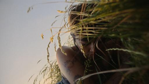 Beabadoobee in the music video for her song “Sun Has Set.” (Photo courtesy of Apple Music)