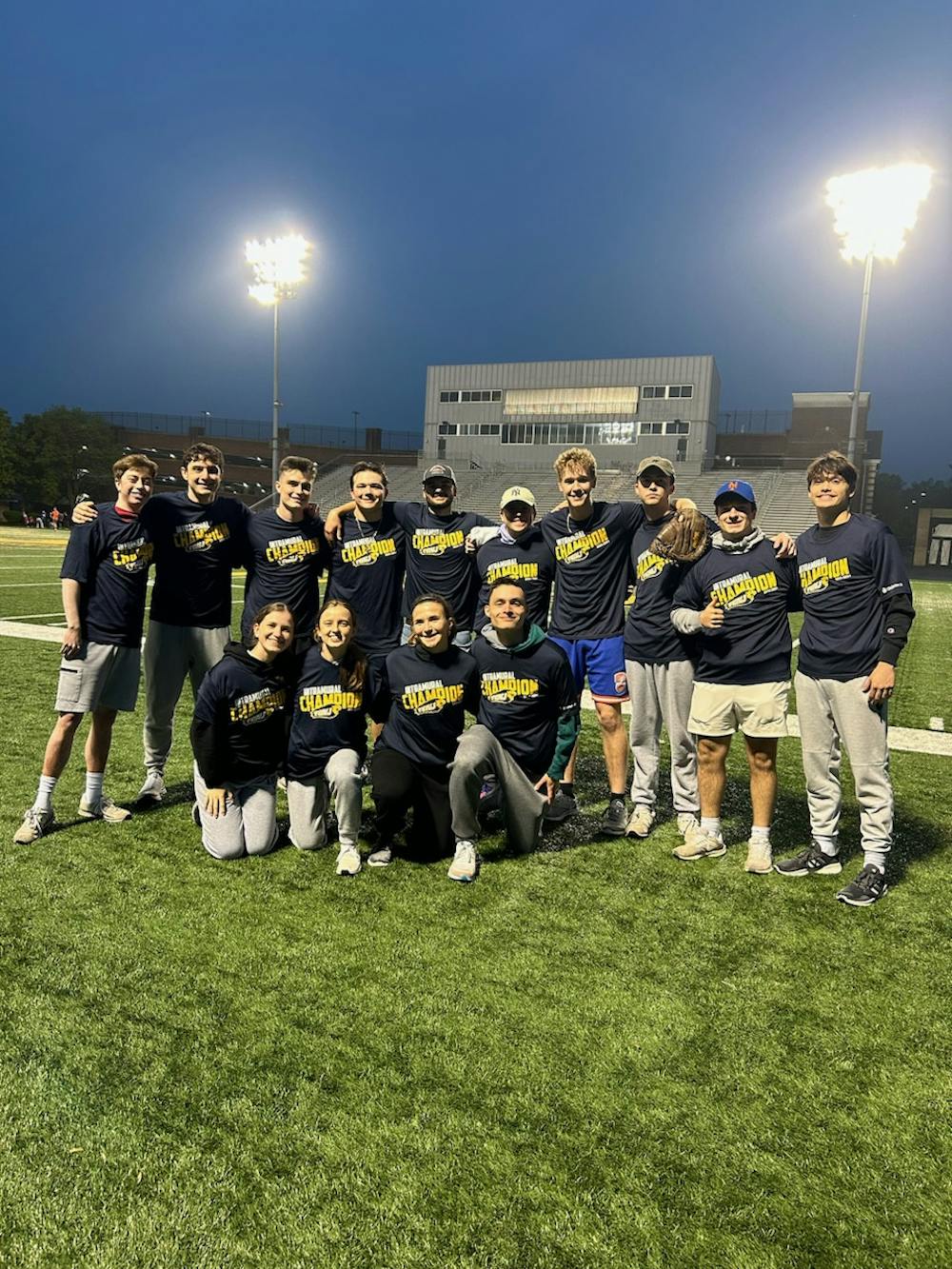 <p><em>The College&#x27;s co-ed intramural softball team celebrates victory. (Photo courtesy of Shawna Dean﻿)</em></p>