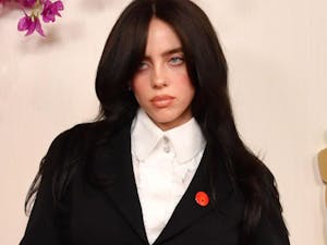 Billie Eilish, a multi-Grammy-winning artist, is encountering backlash due to a sustainability remark directed at bigger artists who release numerous vinyl variants. (Photo courtesy of IMDb)