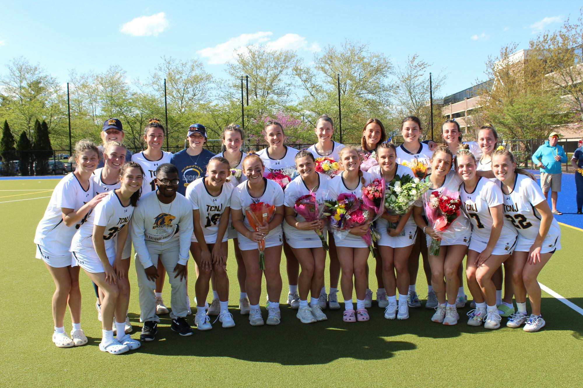 The Lions celebrating after their Senior Day victory (Photo courtesy of Elizabeth Gladstone / Multimedia Coordinator).