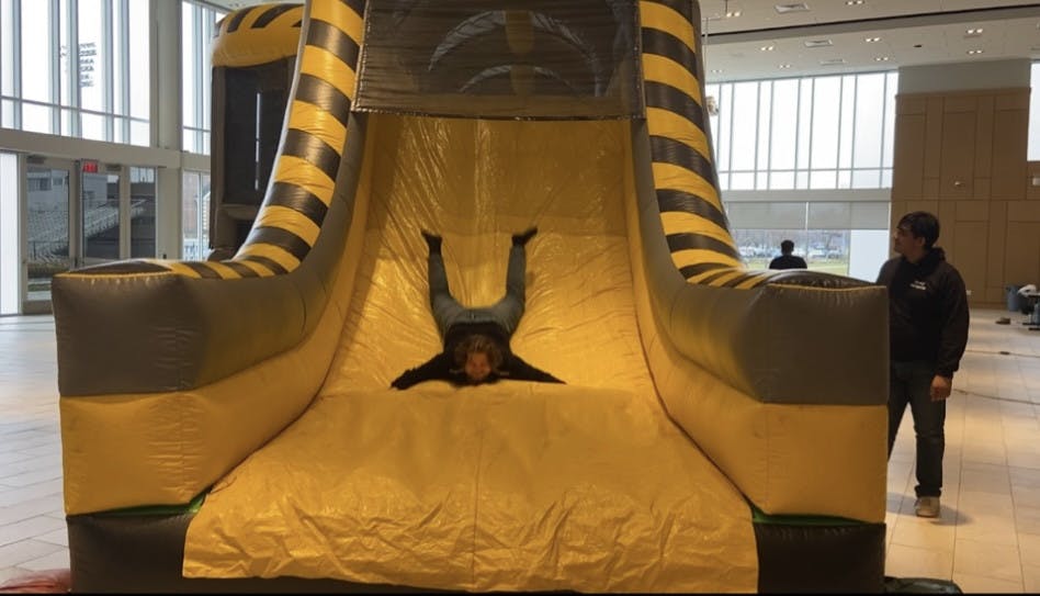 Student finishing the obstacle course in Momentum Mayhem (Photo courtesy of Carla Farris).