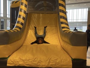 Student finishing the obstacle course in Momentum Mayhem (Photo courtesy of Carla Farris).
