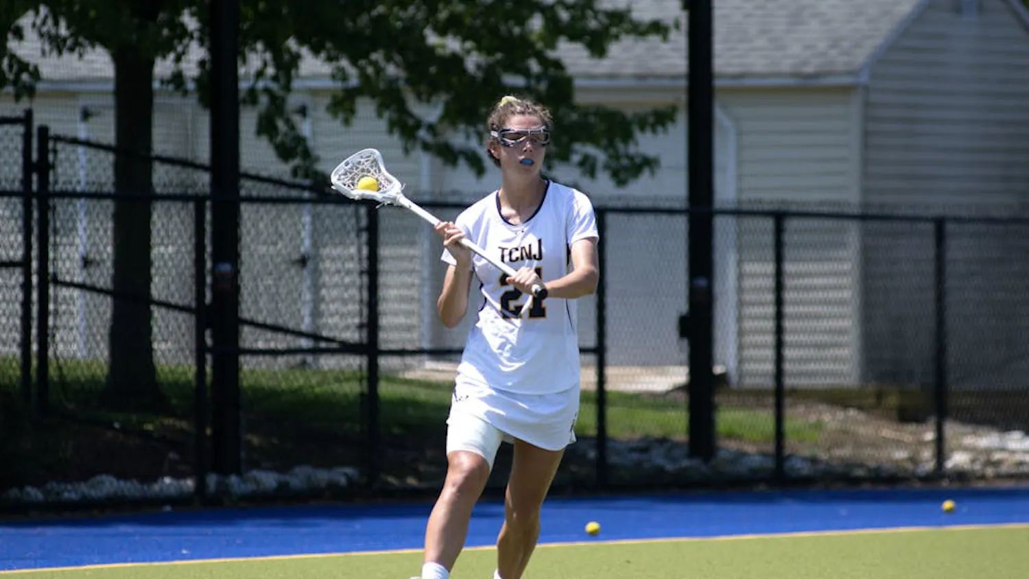 Lacrosse battles on senior day. (Photo courtesy of Jimmy Alagna)