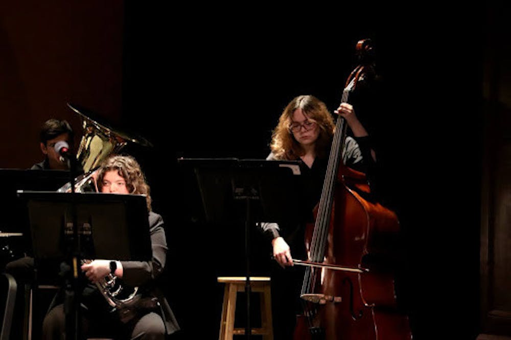 <p><em>Both music groups played a set of three pieces during the show. (Photo by Brooke Zevon / Staff Photographer)</em></p>