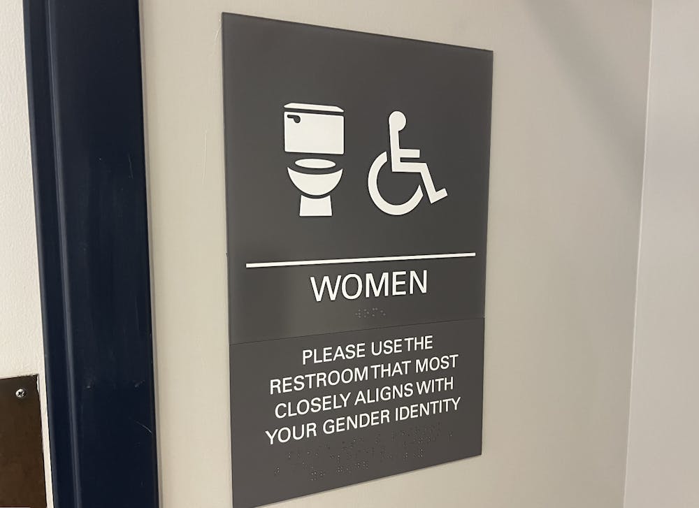 <p><em>A group organized by College Planning collaborated to bring more inclusive bathroom signs to some academic buildings (Photo by Elizabeth Gladstone / Multimedia Coordinator).</em></p>