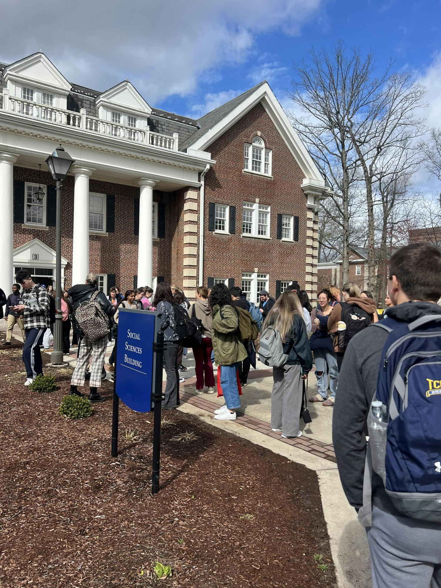 Students evacuated outside of the Social Sciences building (Photo by Alena Bitonti).