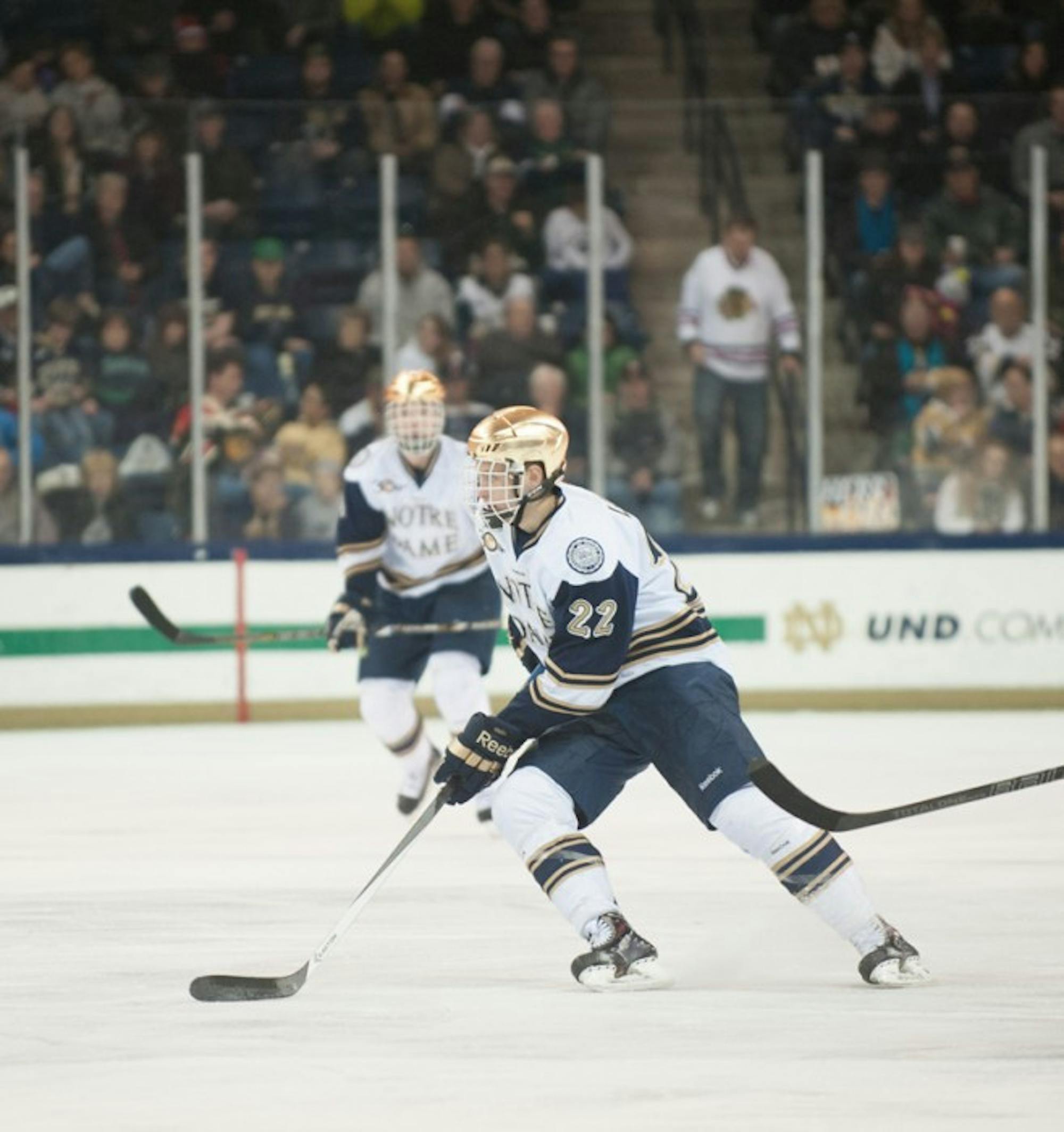Sophomore left wing Mario Lucia looks to receive the puck during Notre Dame's 6-3 victory over Lake Superior State on Jan. 17.