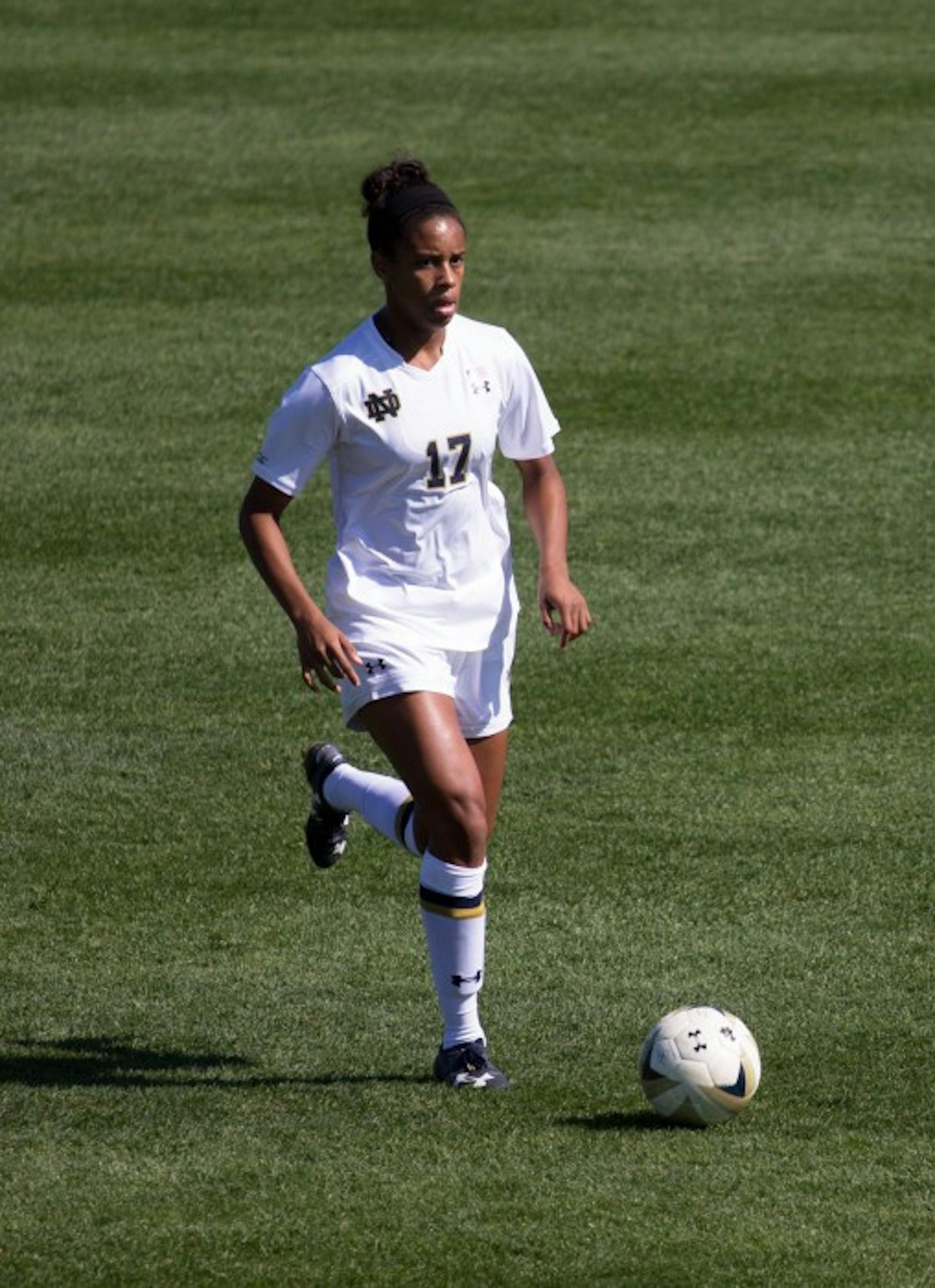 Irish sophomore defender Rachel Heard dribbles up the field  during Notre Dame’s 1-0 loss to Virginia on Oct. 9.