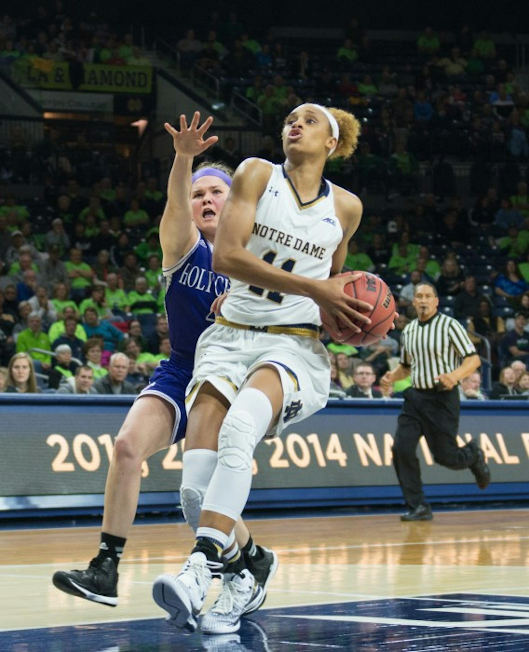 Notre Dame freshman forward Brianna Turner drives to the basket in a 104-29 defeat of Holy Cross on Nov. 23.