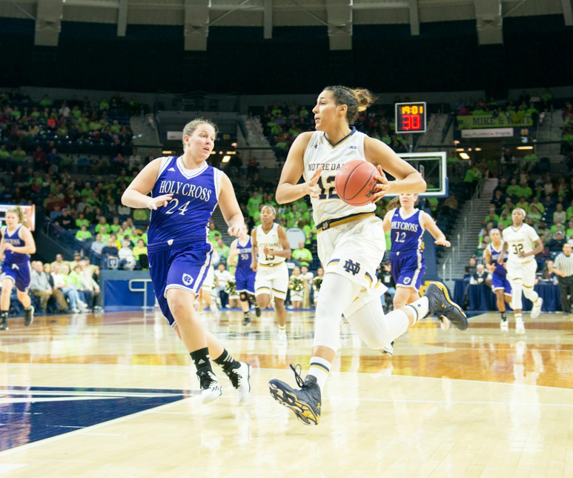Irish sophomore forward Taya Reimer drives during Notre Dame’s 104-29 win over Holy Cross  on Nov. 23 at Purcell Pavilion.