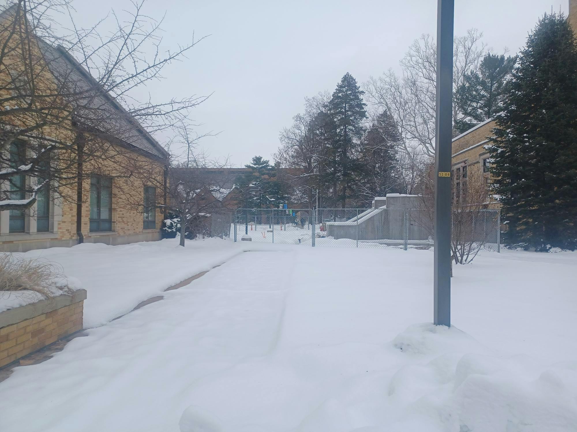 Fence further blocks entrance to campus buildings.jpg