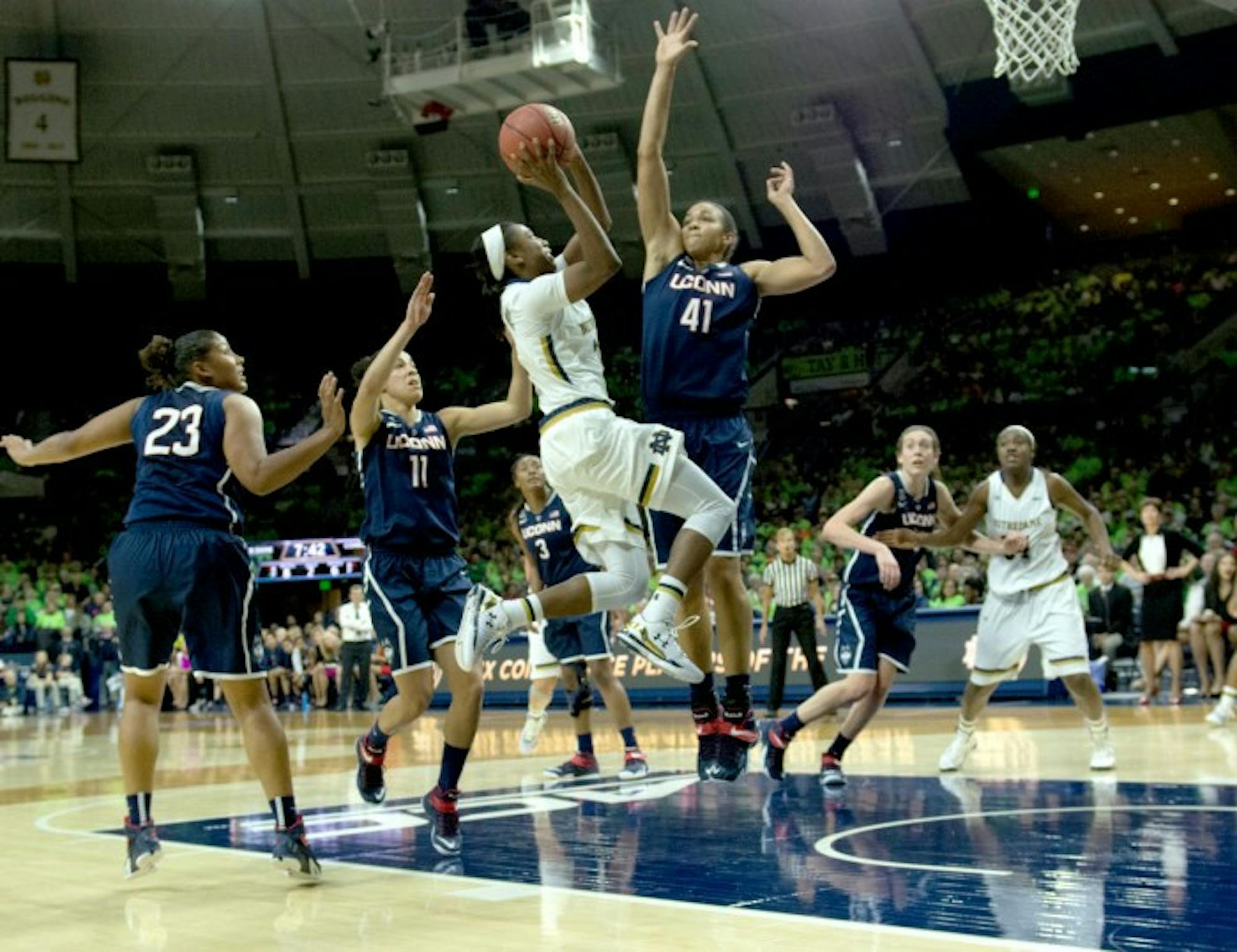 Irish junior guard Jewell Loyd shoots a layup during Notre Dame’s 76-58 loss to Connecticut on Dec. 6 at Purcell Pavilion.