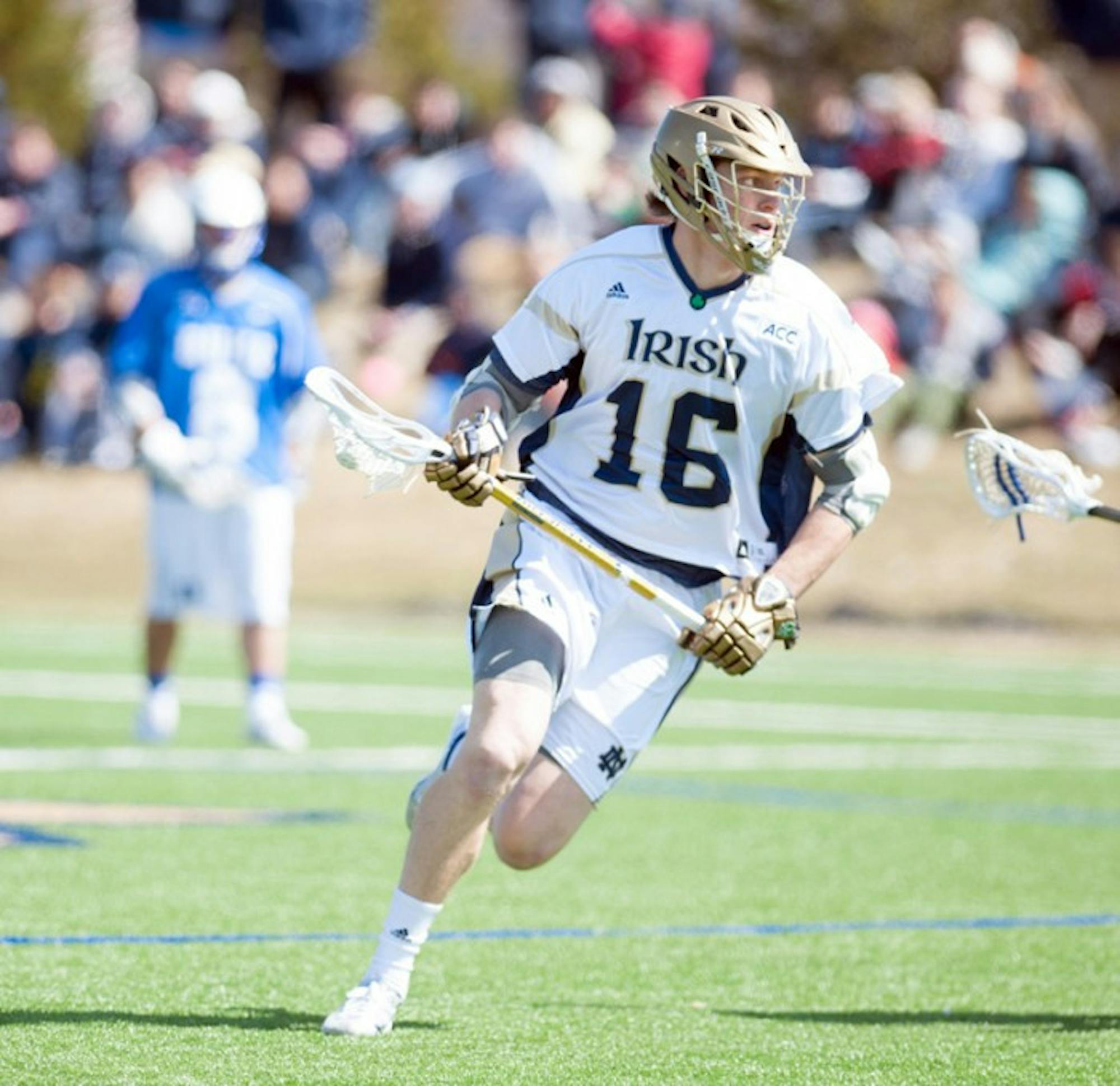 Irish freshman midfielder Sergio Perkovic races downfield during Notre Dame's 15-7 loss to Duke on April 5.