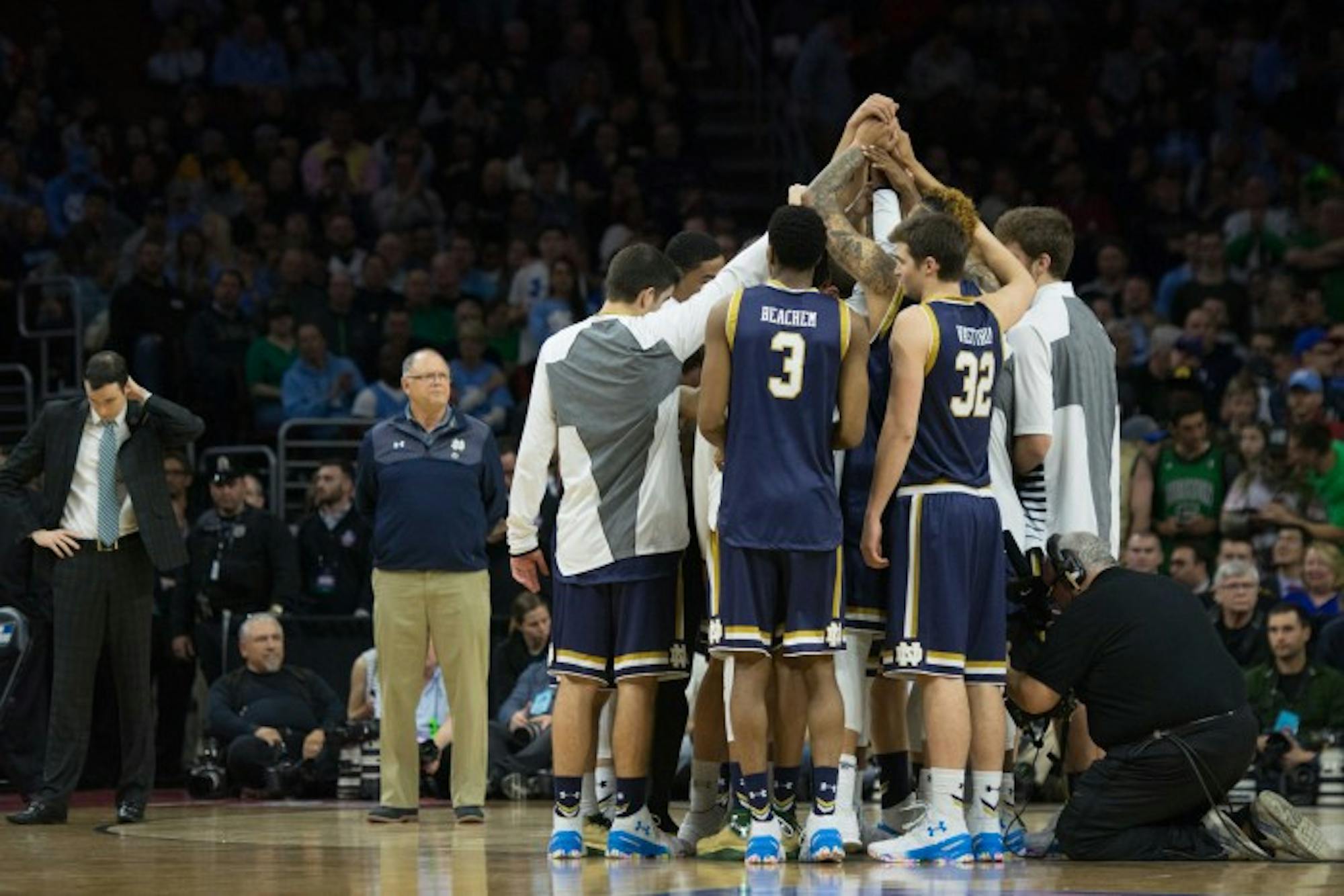 Notre Dame players huddle before their 88-74 loss to North Carolina on Sunday night in Philadelphia.