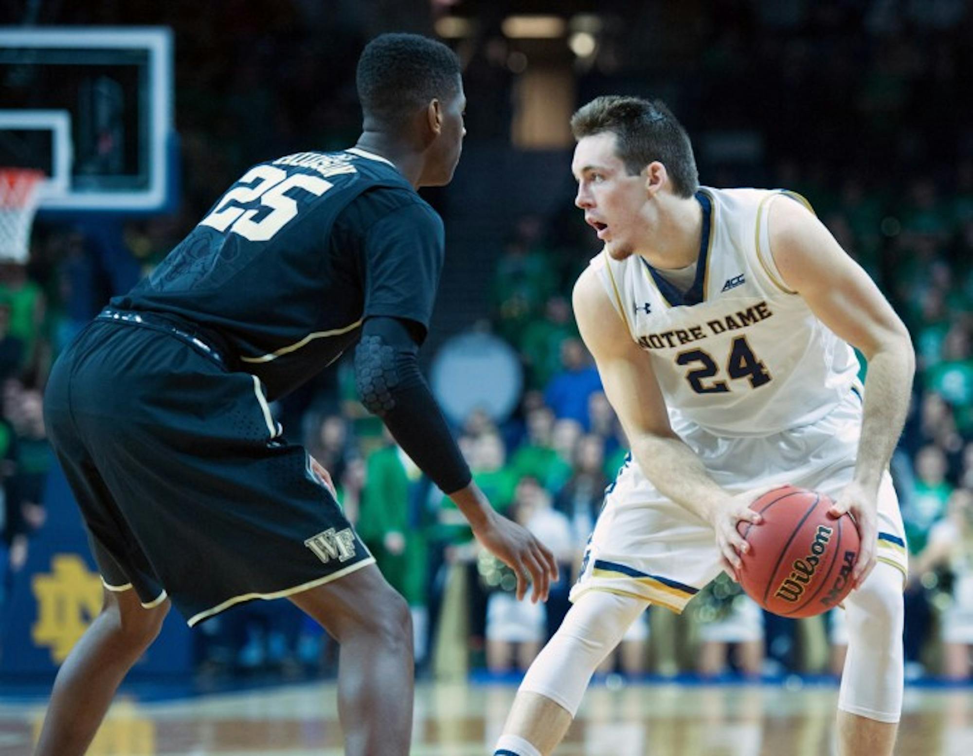 Irish senior guard/forward Pat Connaughton surveys the court during Notre Dame’s 88-75 win over Wake Forest on Tuesday.