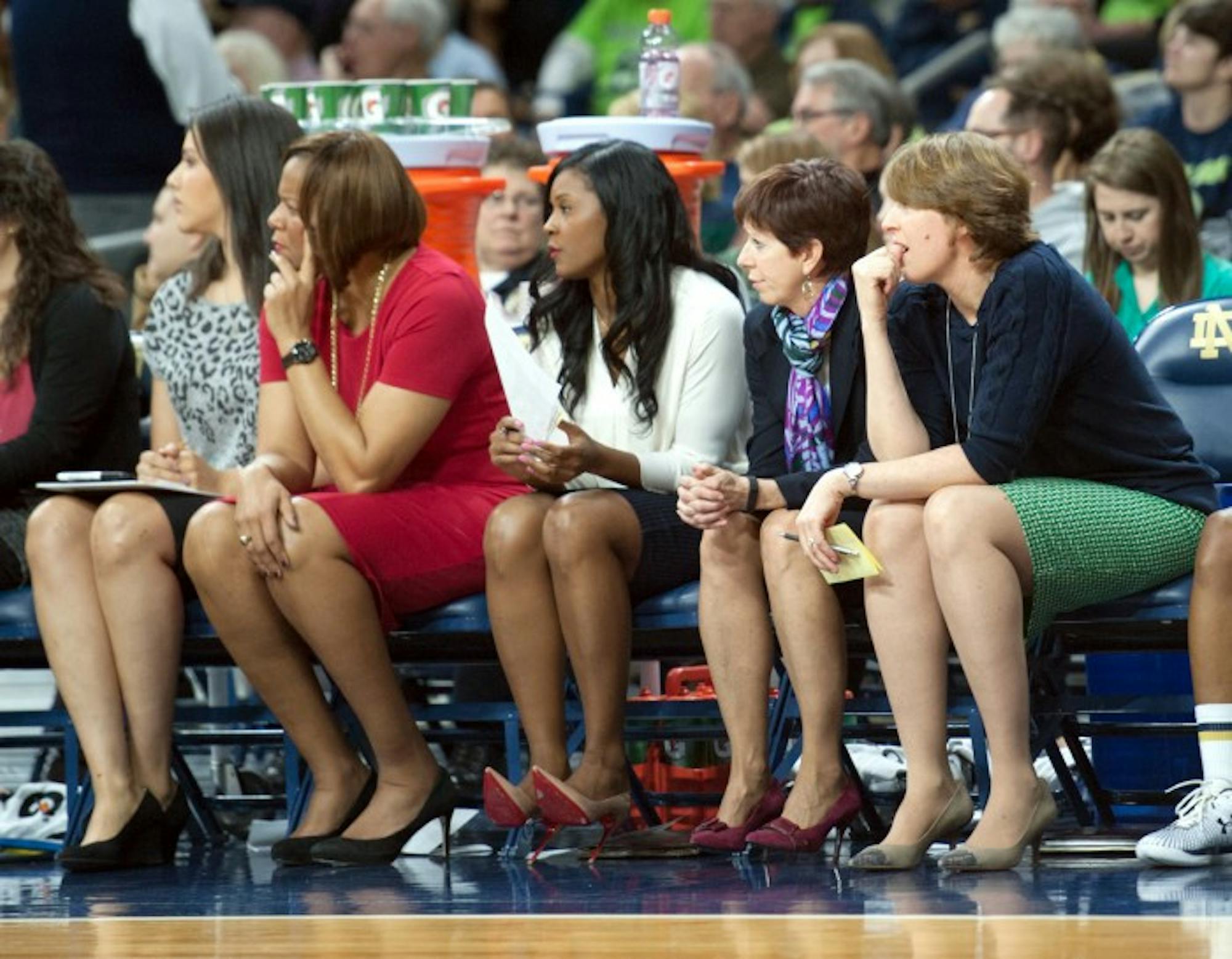 Irish assistant coach Niele Ivey, center, sits courtside during Notre Dame's 89-76 win over Georgia Tech on Jan. 22 at Purcell Pavilion.
