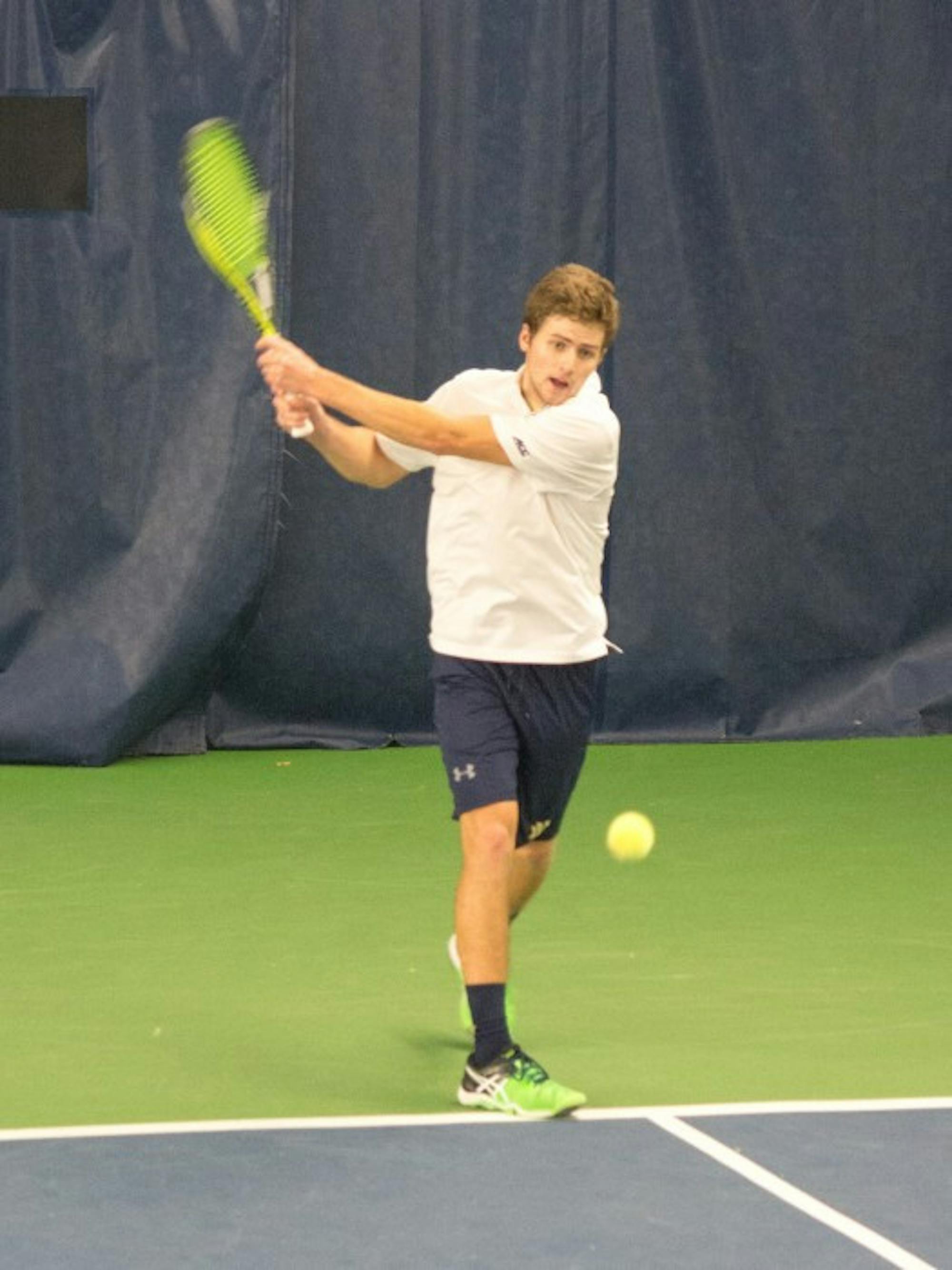 Senior Quentin Monaghan returns a forehand during an Irish 7-0 win over Ball State at Eck Tennis Pavilion on Feb. 7.