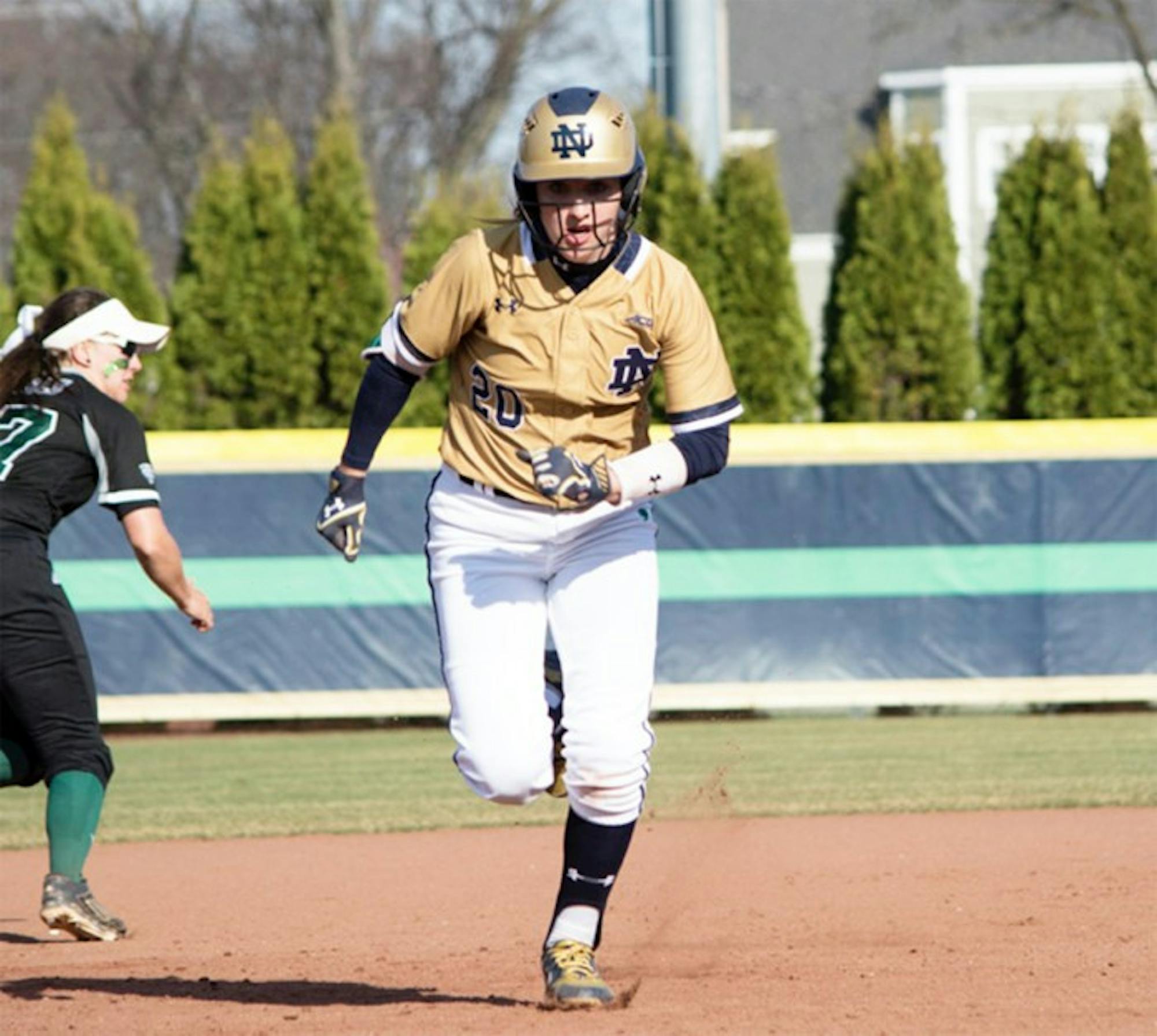 Irish junior infielder Morgan Reed sprints to third base during Notre Dame's 10-2 win over Eastern Michigan on March 22 at Melissa Cook Stadium.