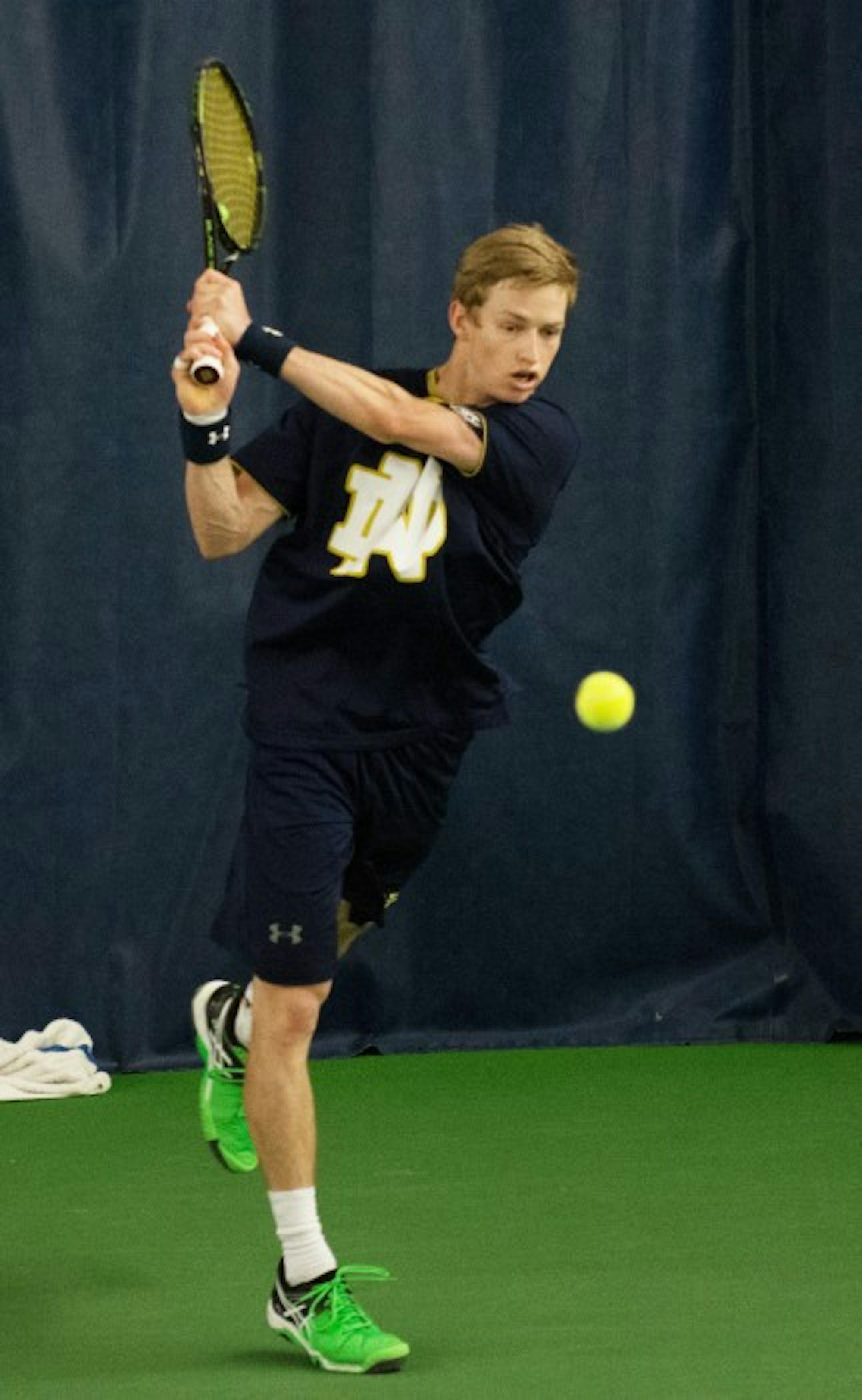 Irish senior Josh Hagar returns a shot during Notre Dame’s 5-2 victory over Duke on March 18 at Eck Tennis Pavilion. In the match, Hagar lost his singles match to sophomore Catalin Mateas 7-6 (6), 6-3.