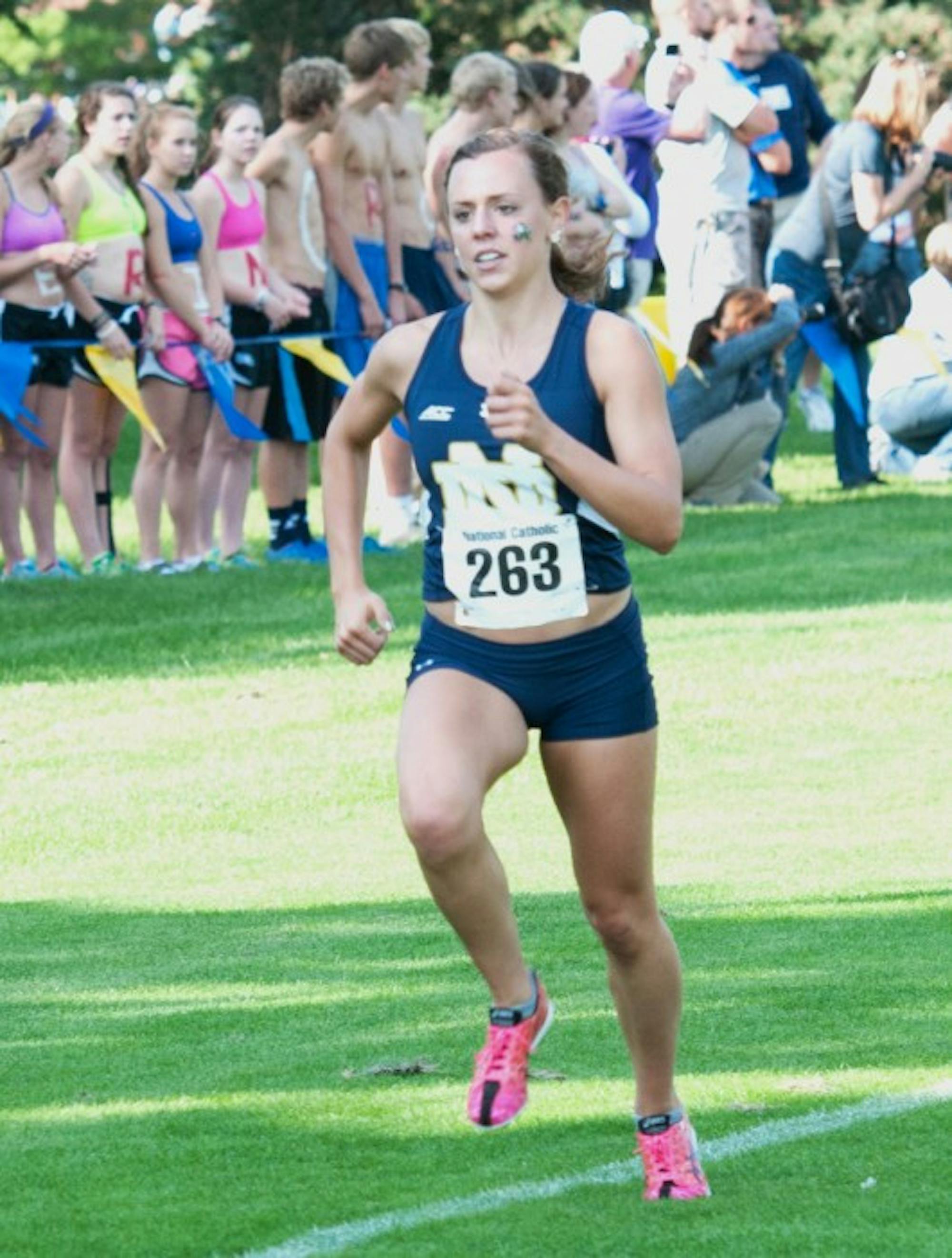 Irish senior runner Sydni Meunier competes in the National Catholic Championships at Notre Dame on Sept. 19, 2014.