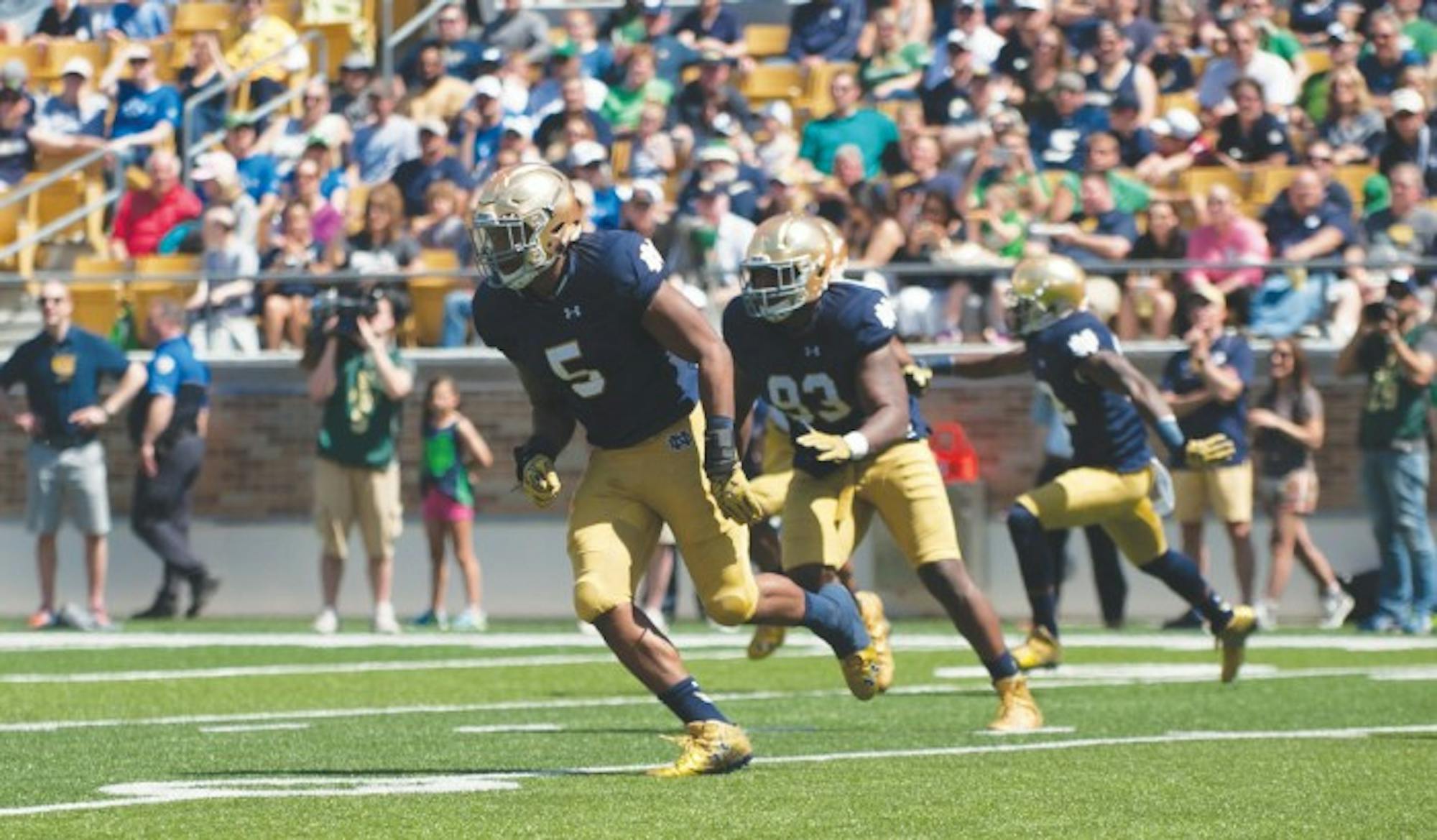 Irish junior linebacker Nyles Morgan, 5, looks to make a play during the Blue-Gold Game on April 17 at Notre Dame Stadium.