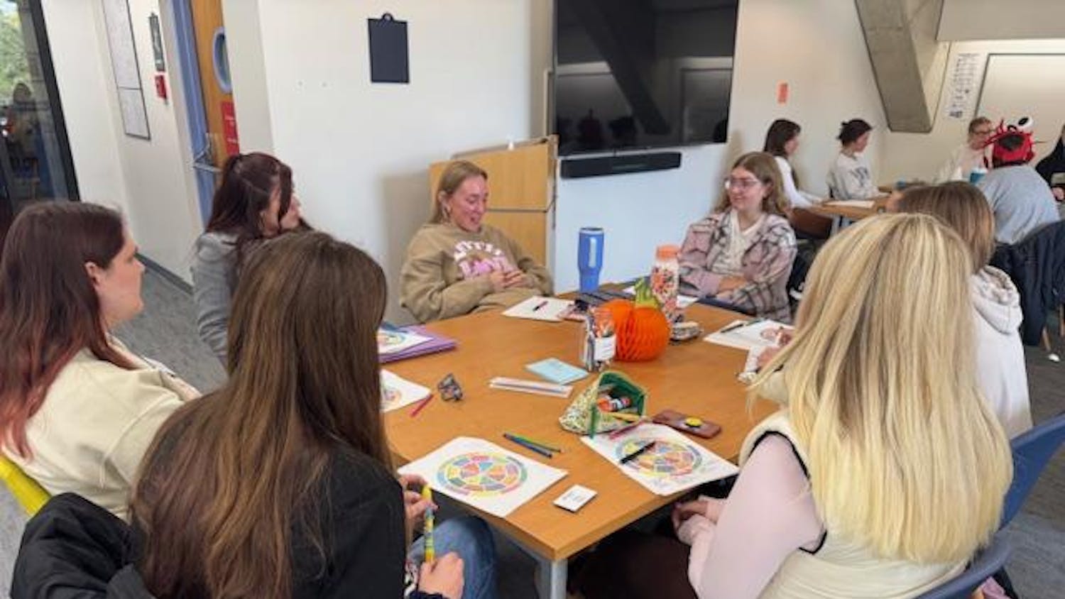 Tutors at the Writing and Tutoring Center train with each other