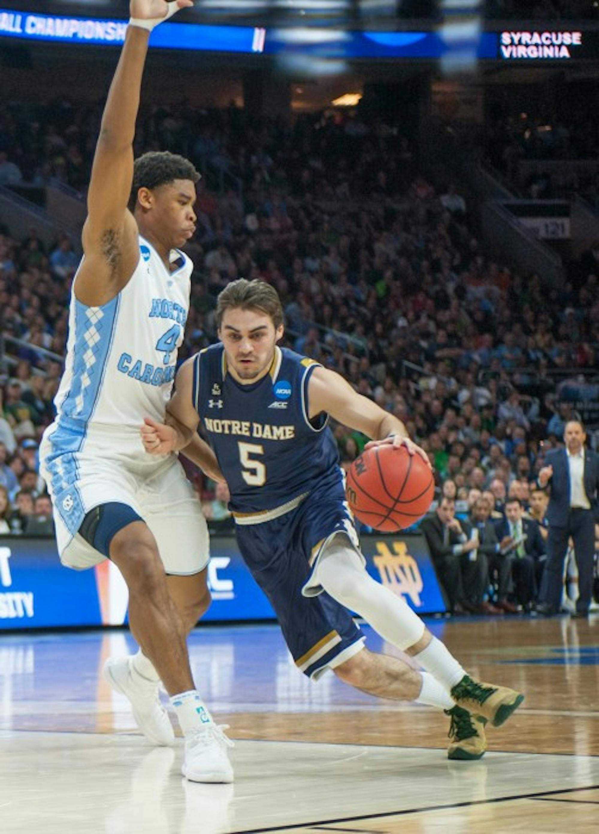 Junior guard Matt Farrell drives into the paint during Notre Dame's 88-74 loss to North Carolina on March 27 in the Elite Eight at Wells Fargo Center.
