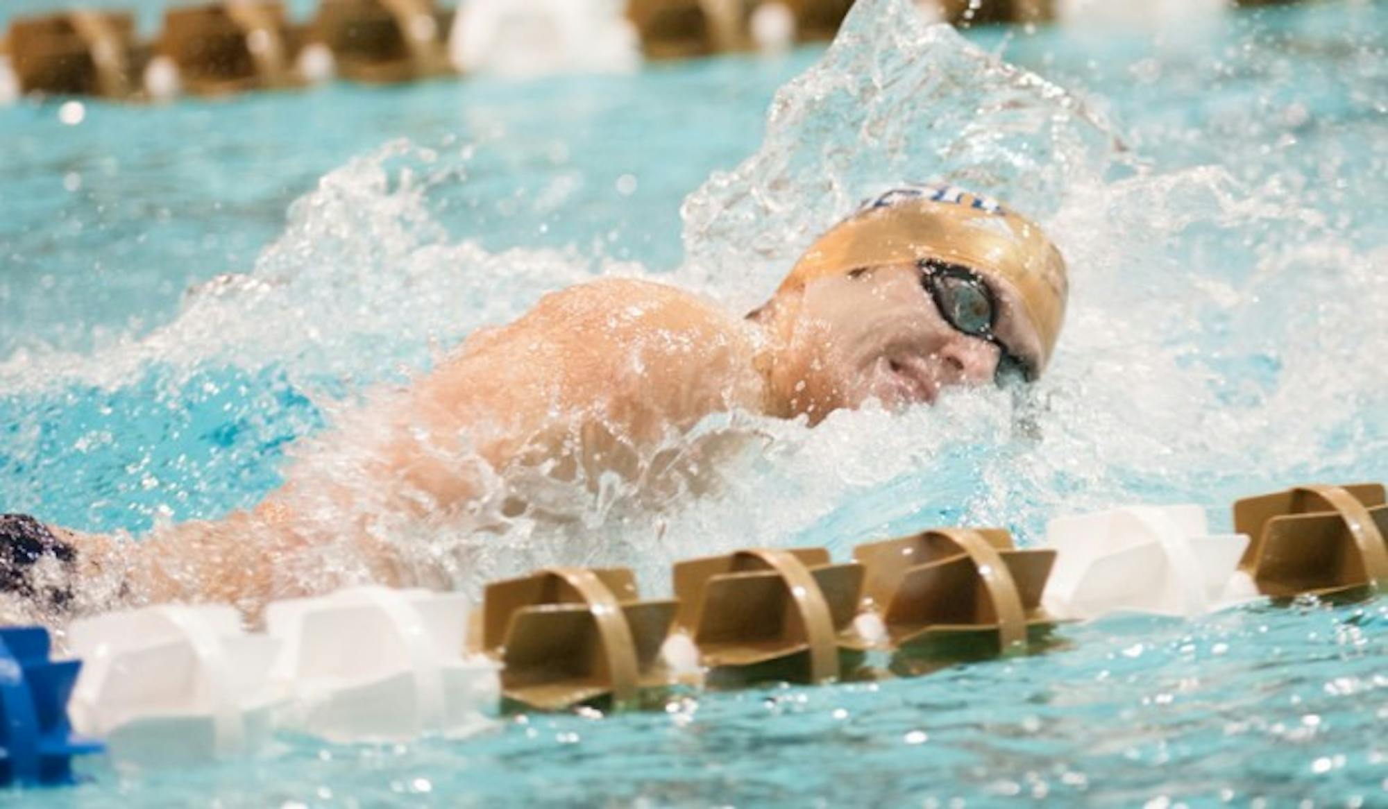 Irish senior Frank Dyer swims in the 200-yard freestyle at the Shamrock Invitational in Rolfs Aquatic Center
