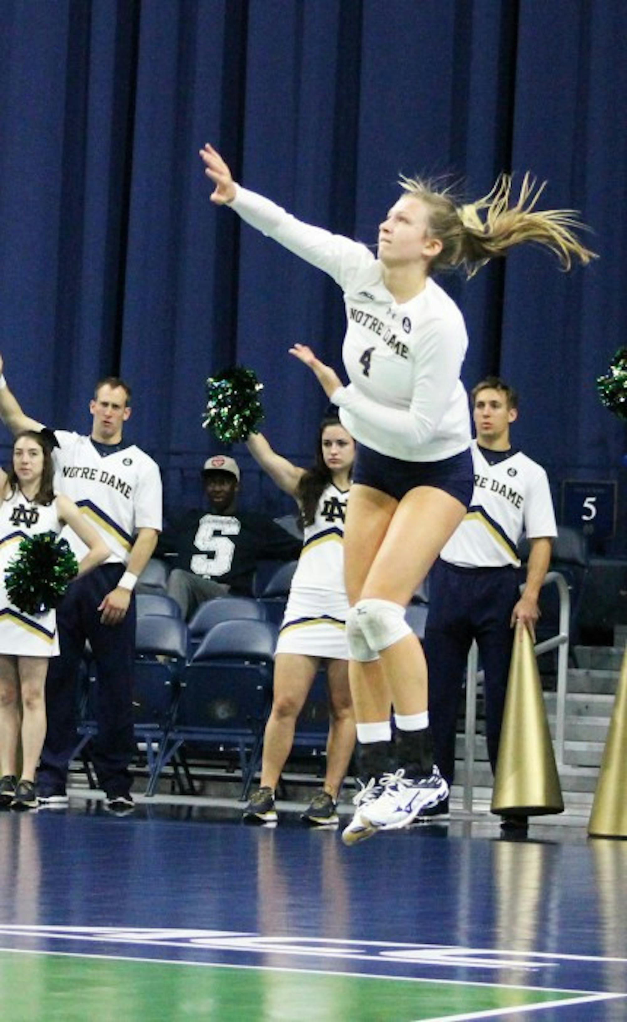 Irish freshman libero Ryann DeJarld serves to start a rally during Notre Dame’s 3-2 loss to Syracuse on Oct. 4 at Purcell Pavilion. DeJarld had a match-high 28 digs in the loss.