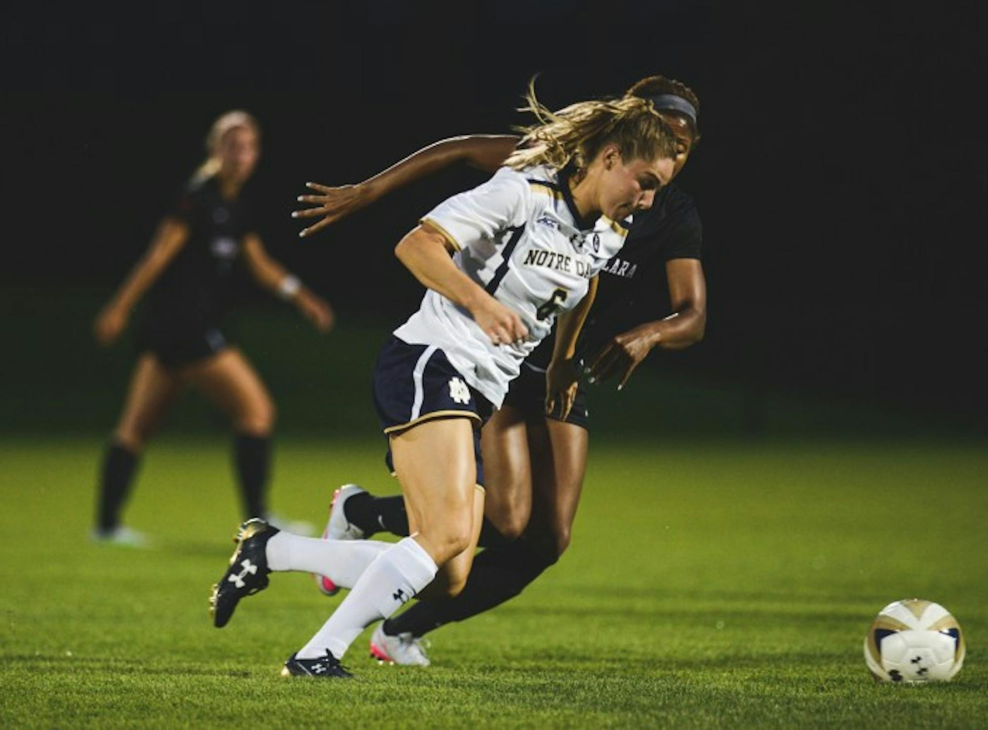 Senior forward Anna Maria Gilberston dribbles away from a defender during Notre Dame’s 2-1 victory over Santa Clara on Aug. 28 at Alumni Stadium. Gilbertson had two goals in Friday’s win against Virginia Tech.
