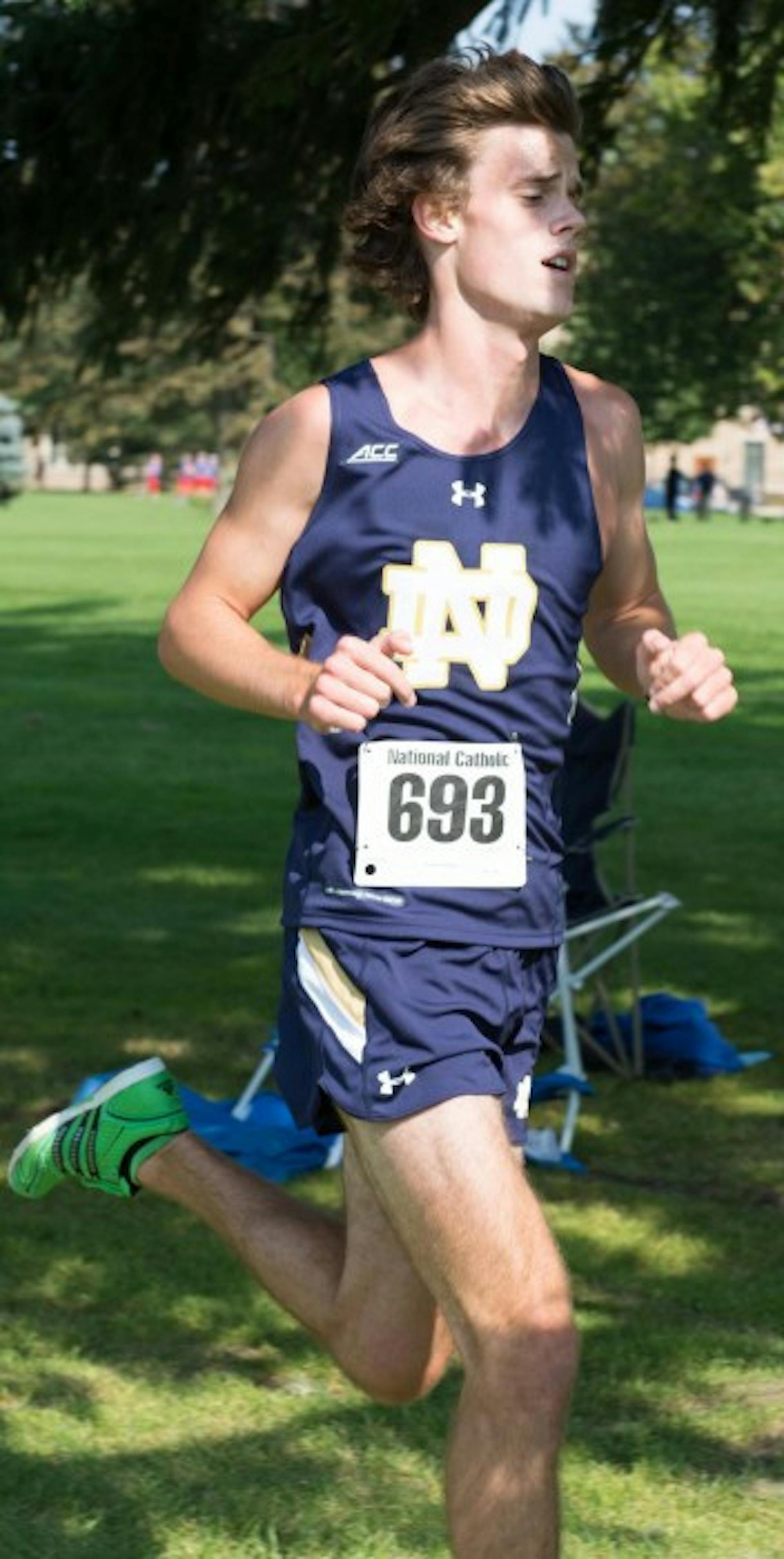 Sophomore Calvin Kraft runs in last year’s National Catholic Championships on Sept. 19 at Notre Dame Golf Course.