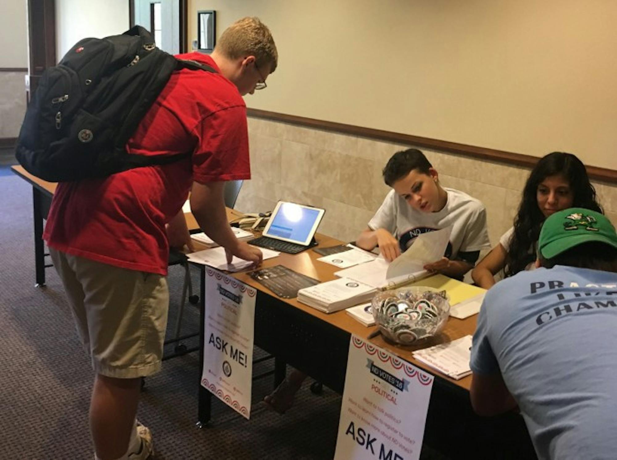 A student registers to vote in the Coleman-Morse Center as part of ND Votes’  Welcome Weekend  registration drive. Volunteers registered first-year and transfer students to vote in the 2016 election.