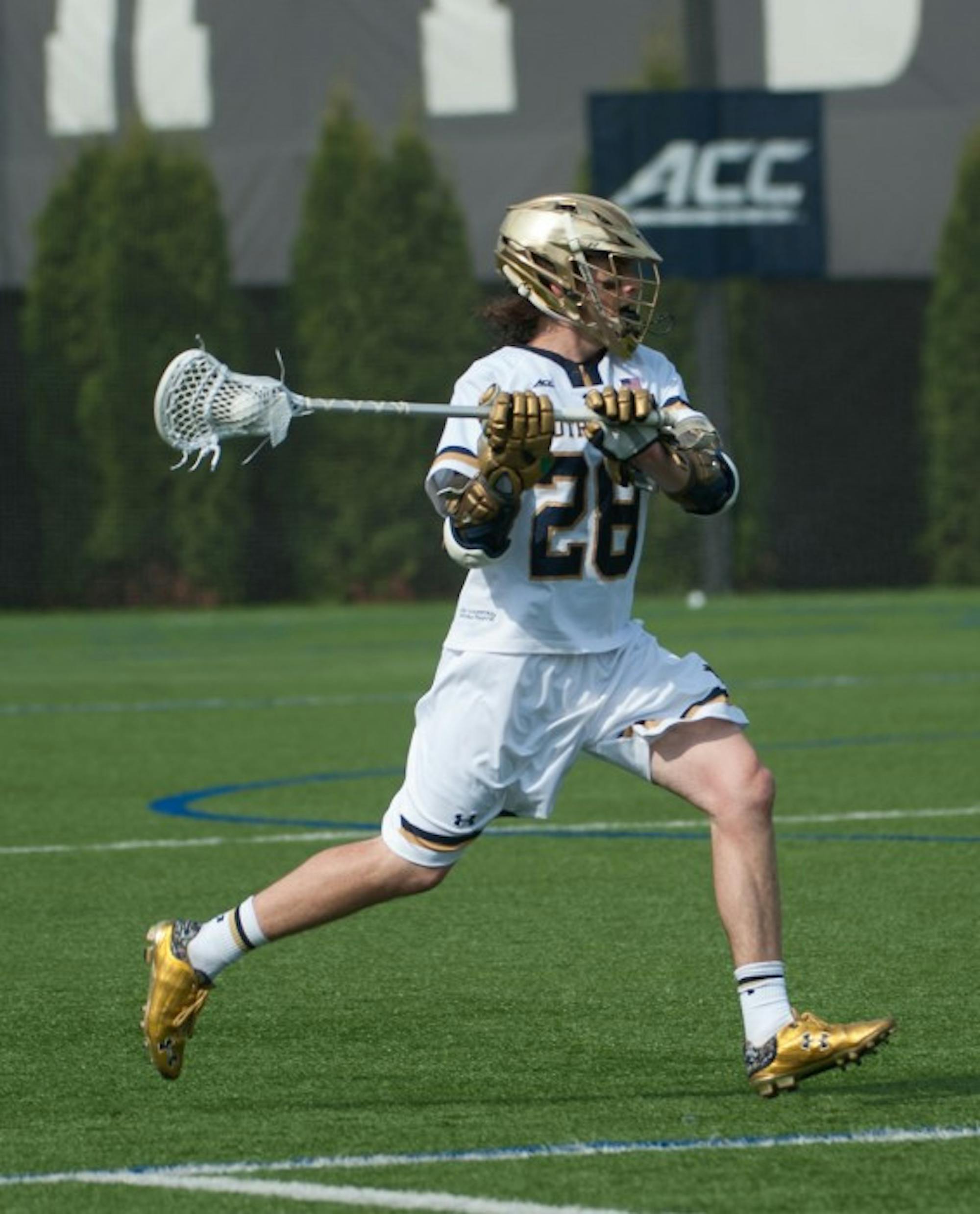 Senior attack Conor Doyle looks to pass in a 15-14 win against North Carolina on Sunday. Doyle had three goals in the victory.