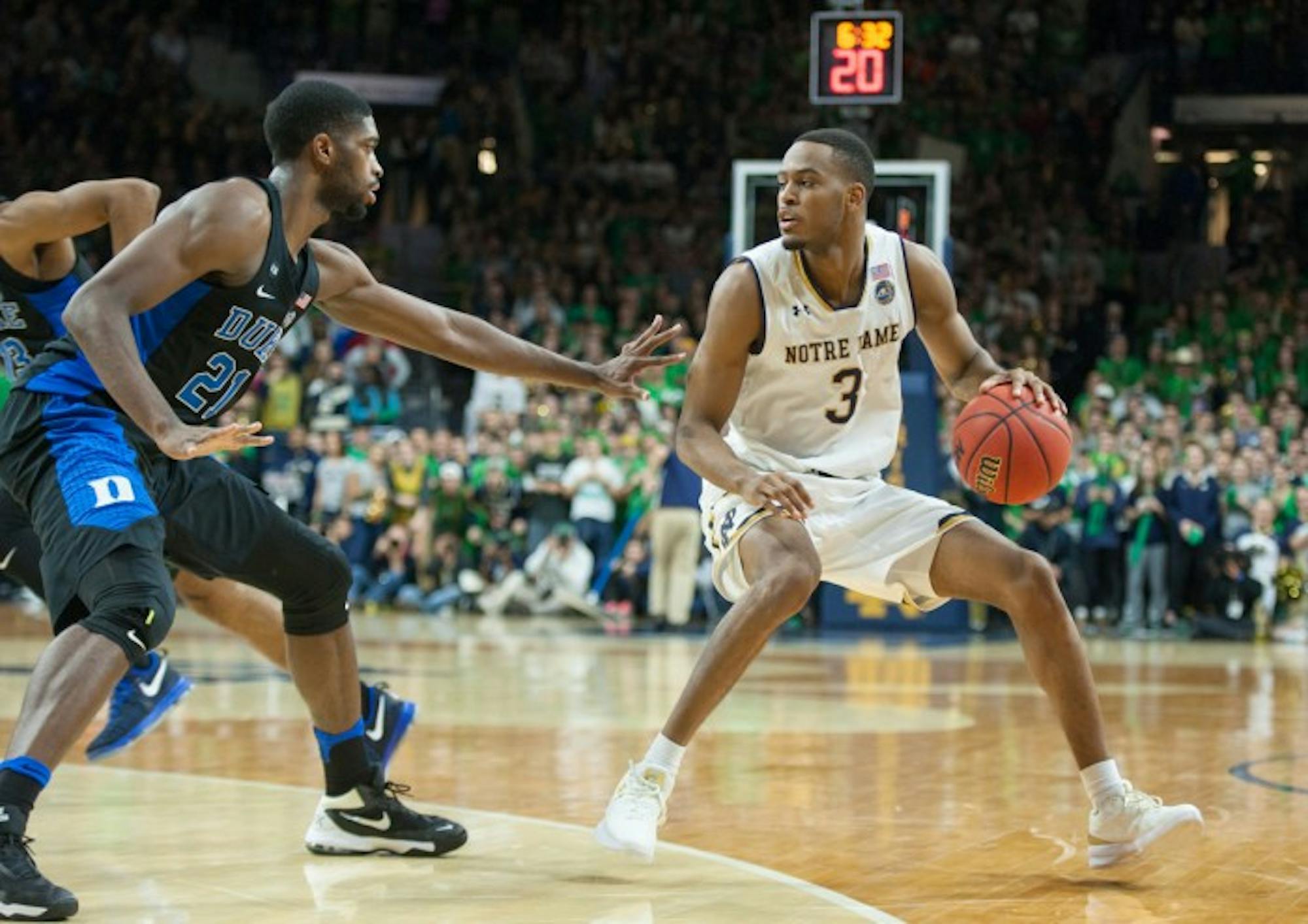 Irish junior forward V.J. Beachem dribbles away from a defender during Notre Dame’s 84-74 loss to Duke on Monday at Purcell Pavilion. Beachem paced the Irish with 20 points against the Blue Devils.