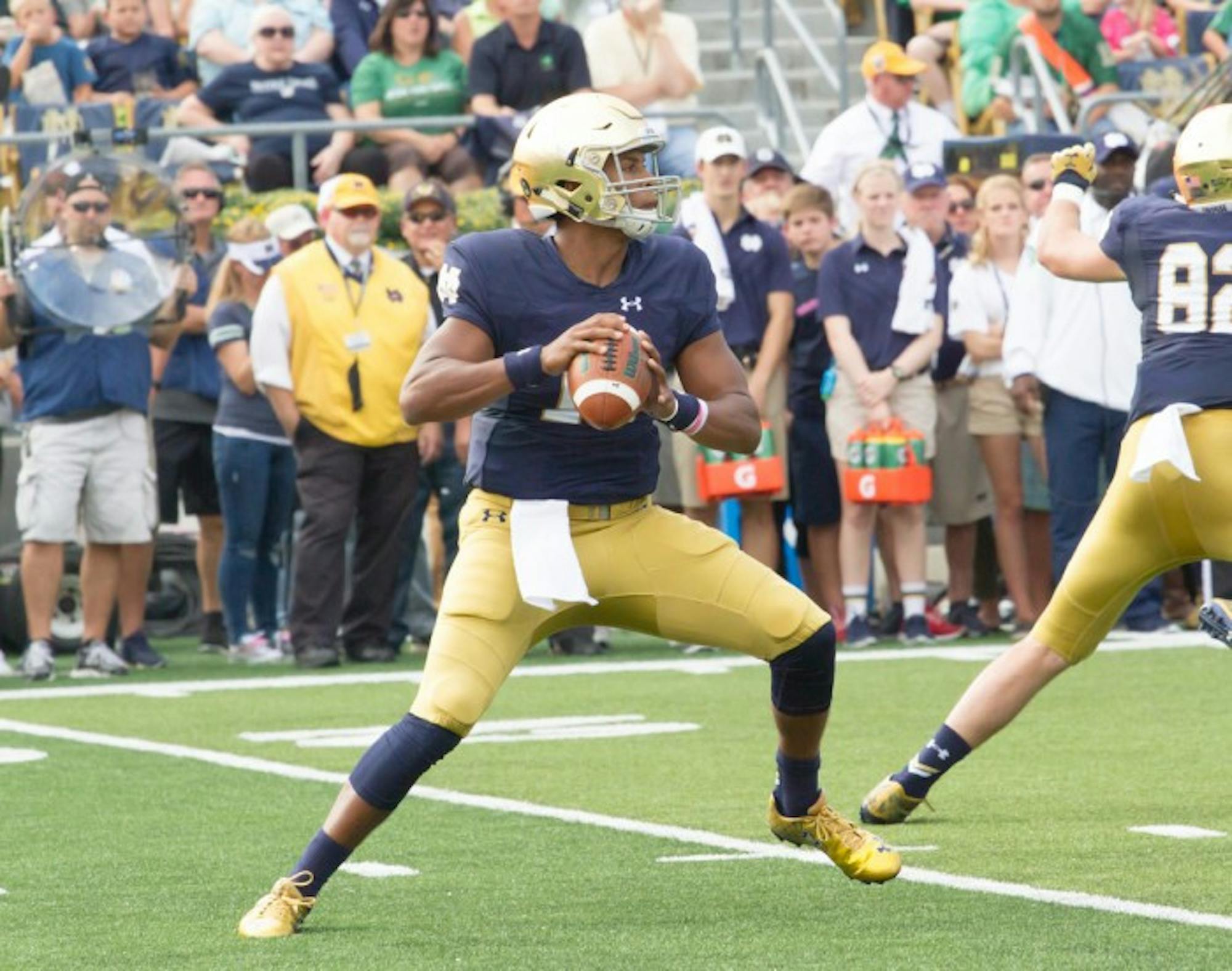 Irish freshman quarterback Brandon Wimbush scores a touchdown during Notre Dame’s 62-27 win over Massachusetts on Saturday at Notre Dame Stadium. Wimbush had four carries for 92 yards in the game.