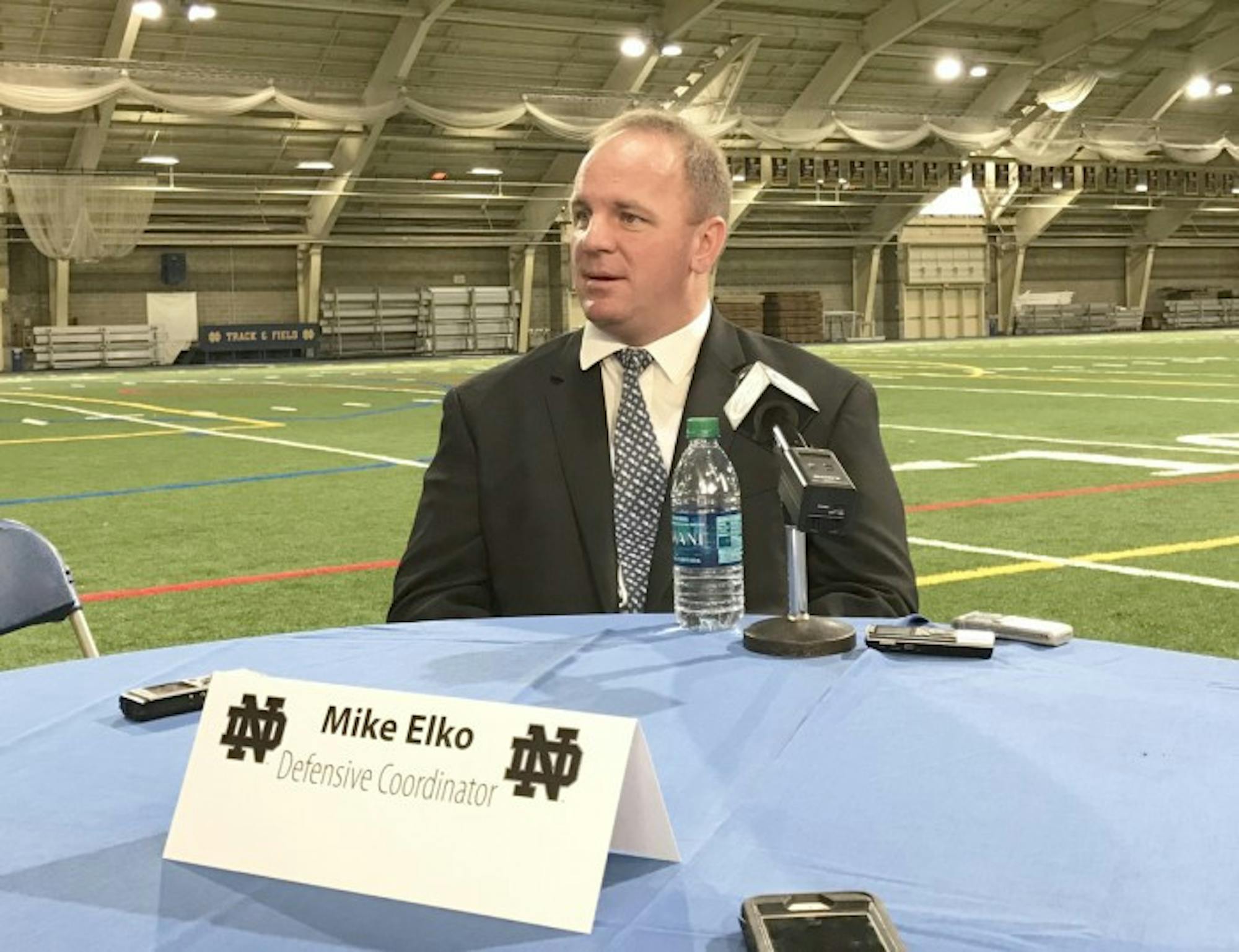 Irish defensive coordinator Mike Elko speaks with the media during the introductory press conference for new coaches Monday.