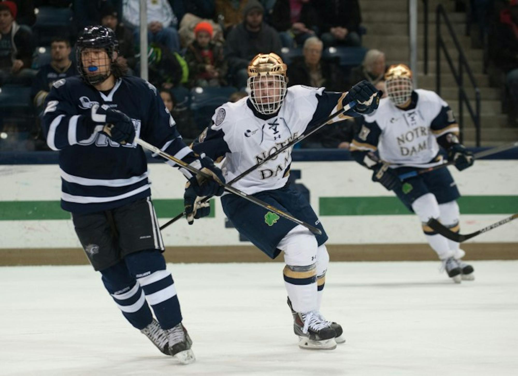 Sophomore right winger Ben Ostlie skates during Notre Dame's 5-2 loss to New Hampshire on Jan. 30 at Compton Family Ice Arena.