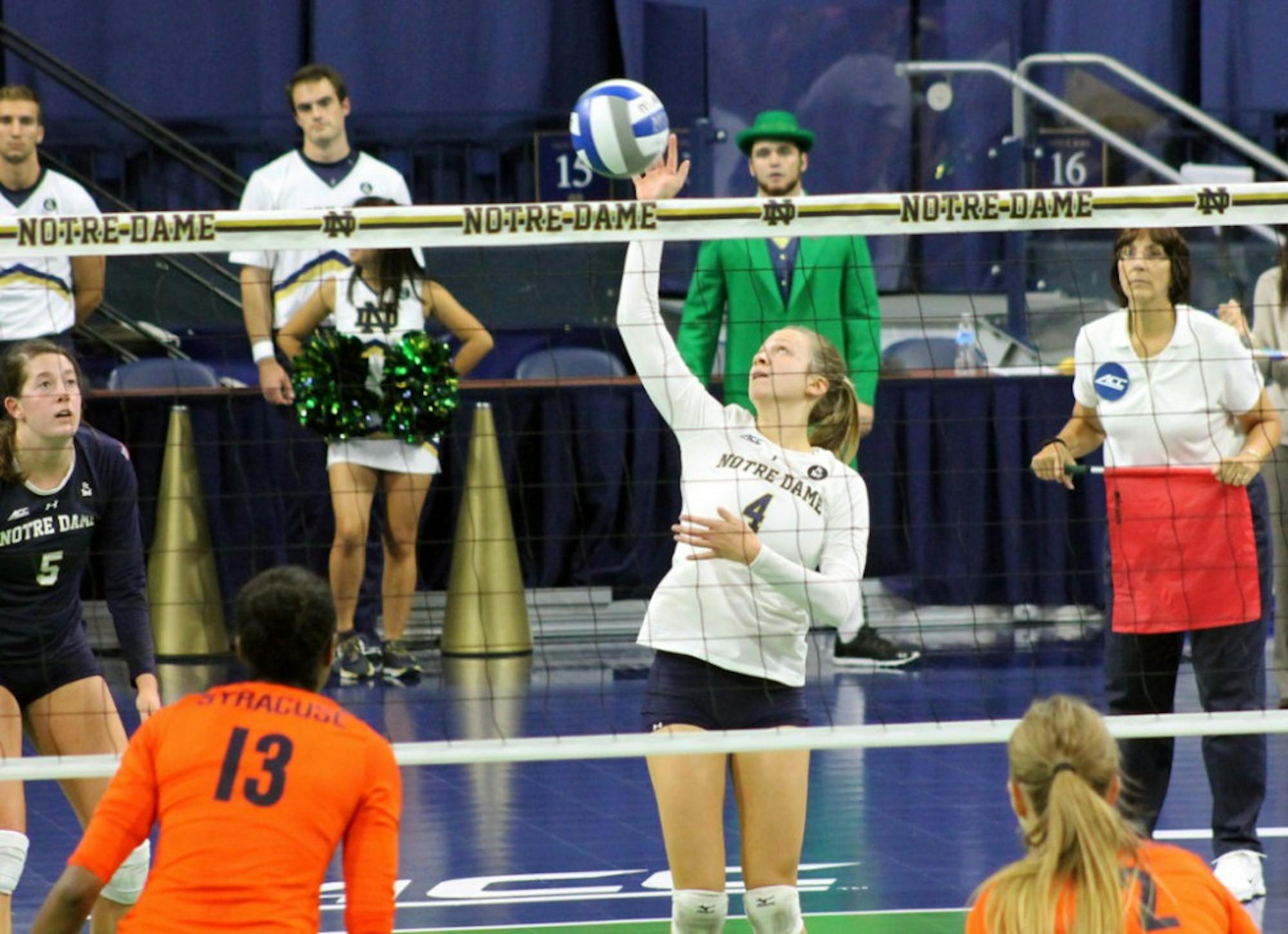 Irish freshman libero Ryann DeJarld tips the ball back over the net in Notre Dame’s 3-2 loss to Syracuse at Purcell Pavilion.