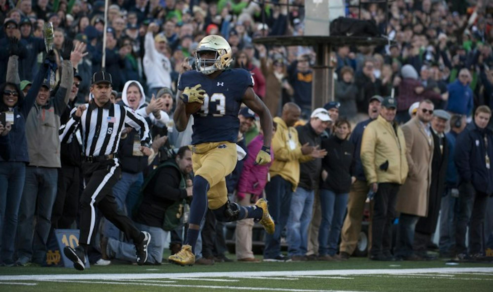 Irish freshman running back Josh Adams dashes for the end zone at the end of his 98-yard touchdown run in Notre Dame’s 28-7 win over Wake Forest on Saturday at Notre Dame Stadium.  Adams’ run, in his first career start, was the longest play from scrimmage in Notre Dame history, breaking Blair Kiel and Joe Howard’s 34-year-old record.