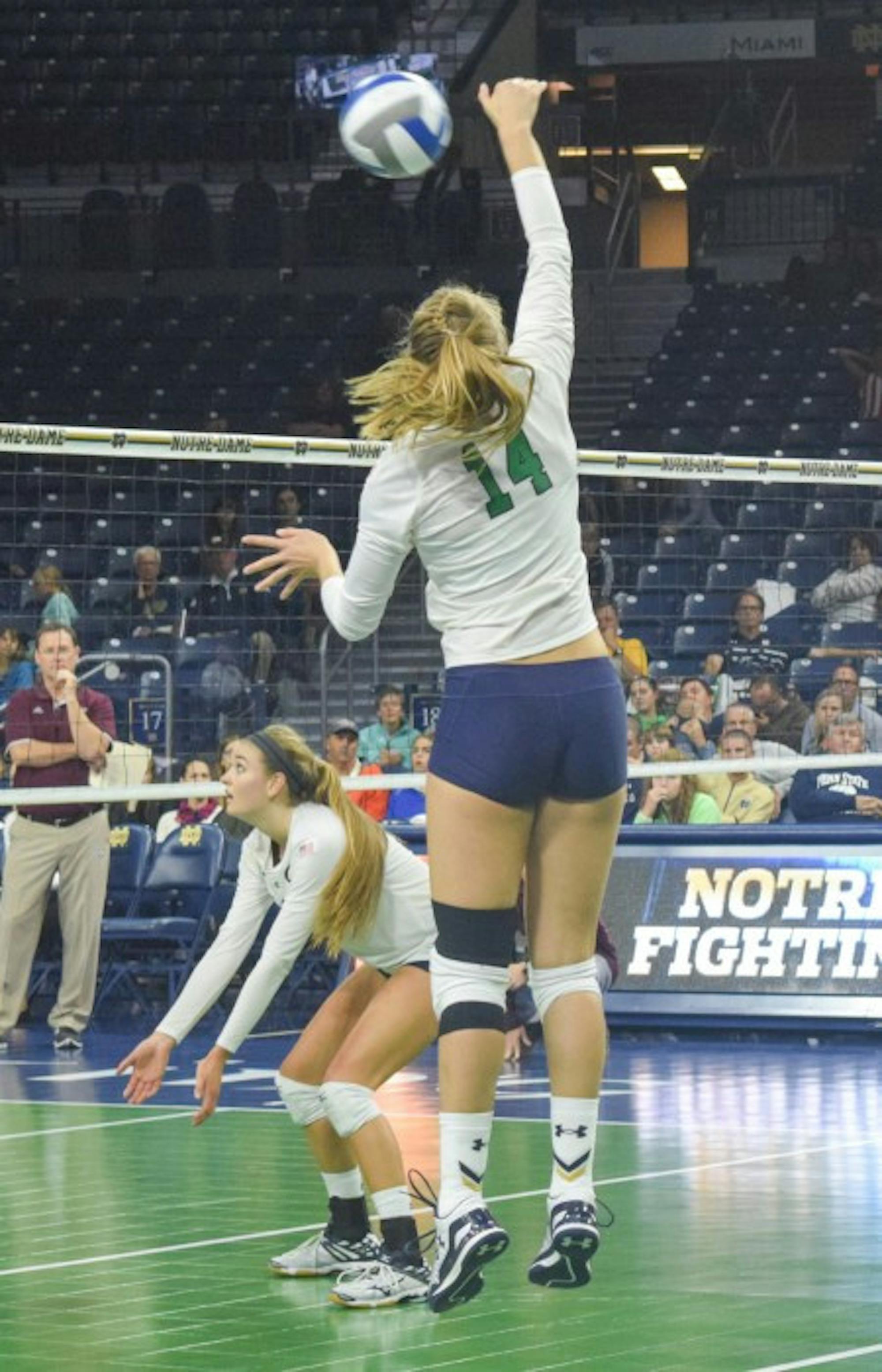 Senior outside hitter Haley Bonneval attacks the net in a 3-1 victory over Mississippi State during the Golden Dome Invitational on Sept. 11. The Irish return to Purcell Pavilion on Friday against Louisville.