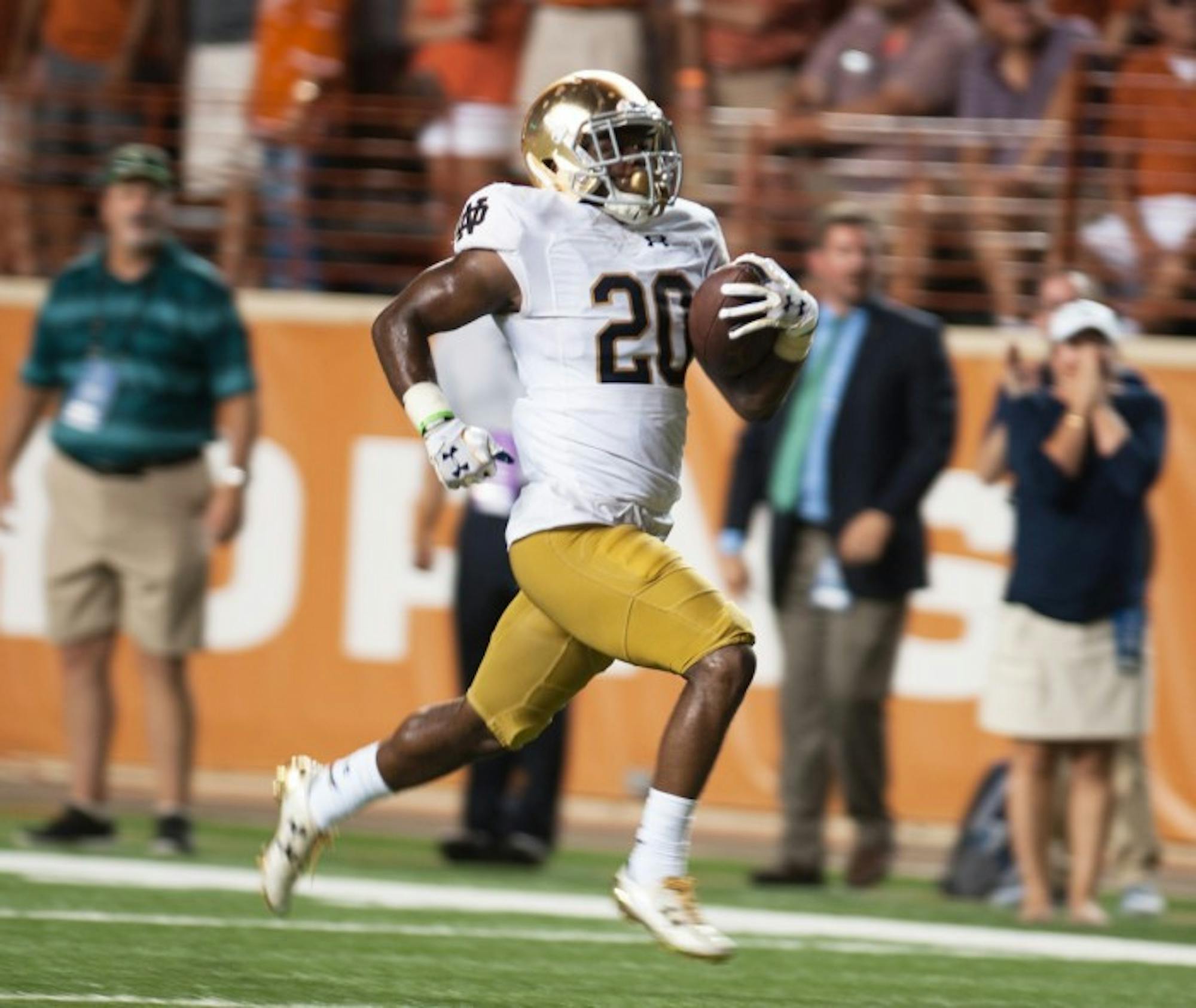 Irish sophomore cornerback Shaun Crawford carries the ball during Notre Dame's 50-47 loss to Texas on Sept. 4. Brian Kelly announced that Crawford will not play for the rest of the season due to an ACL injury.